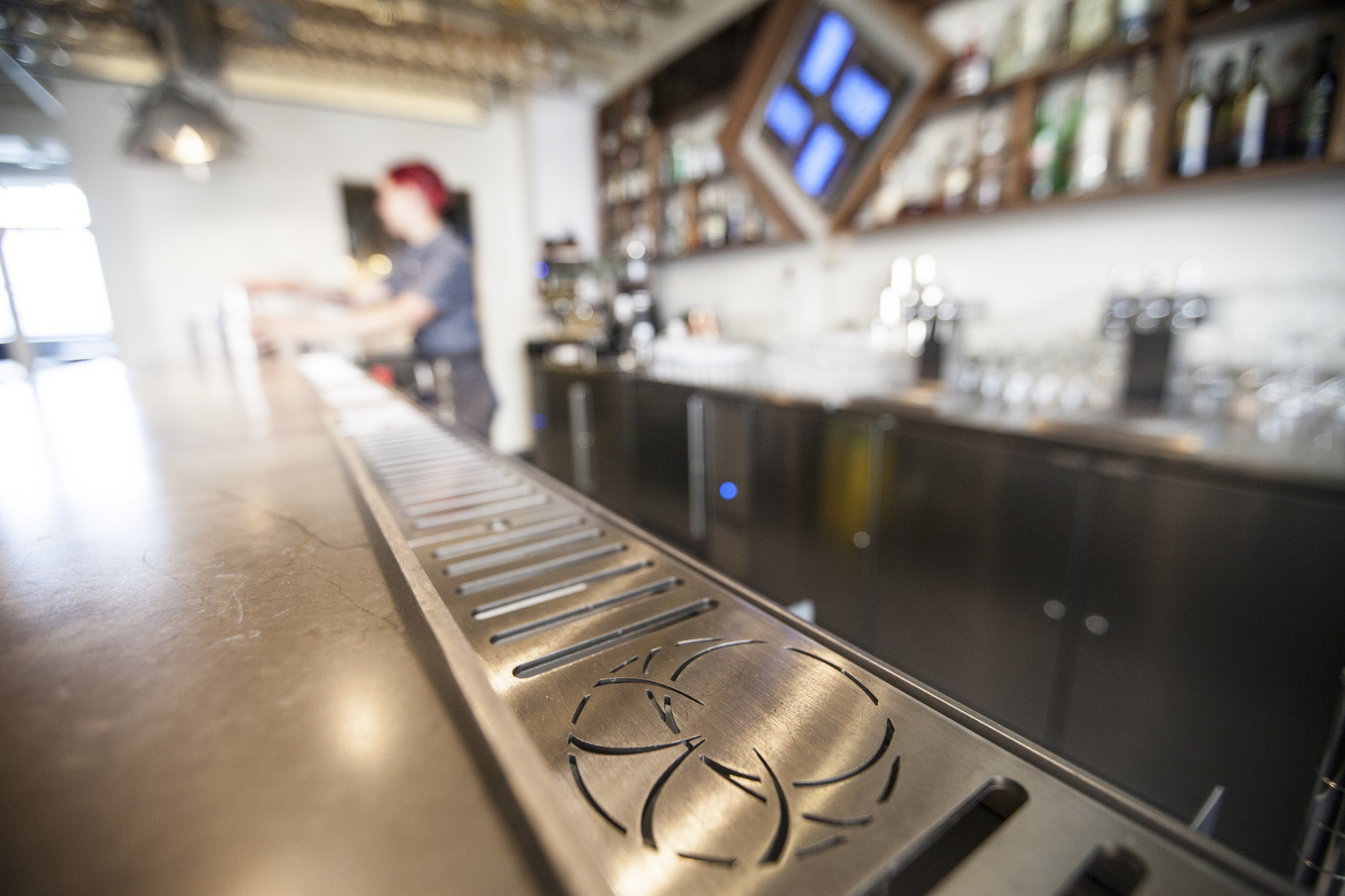 In the bar drip tray, we designed a custom Longnow logo among the drainage.