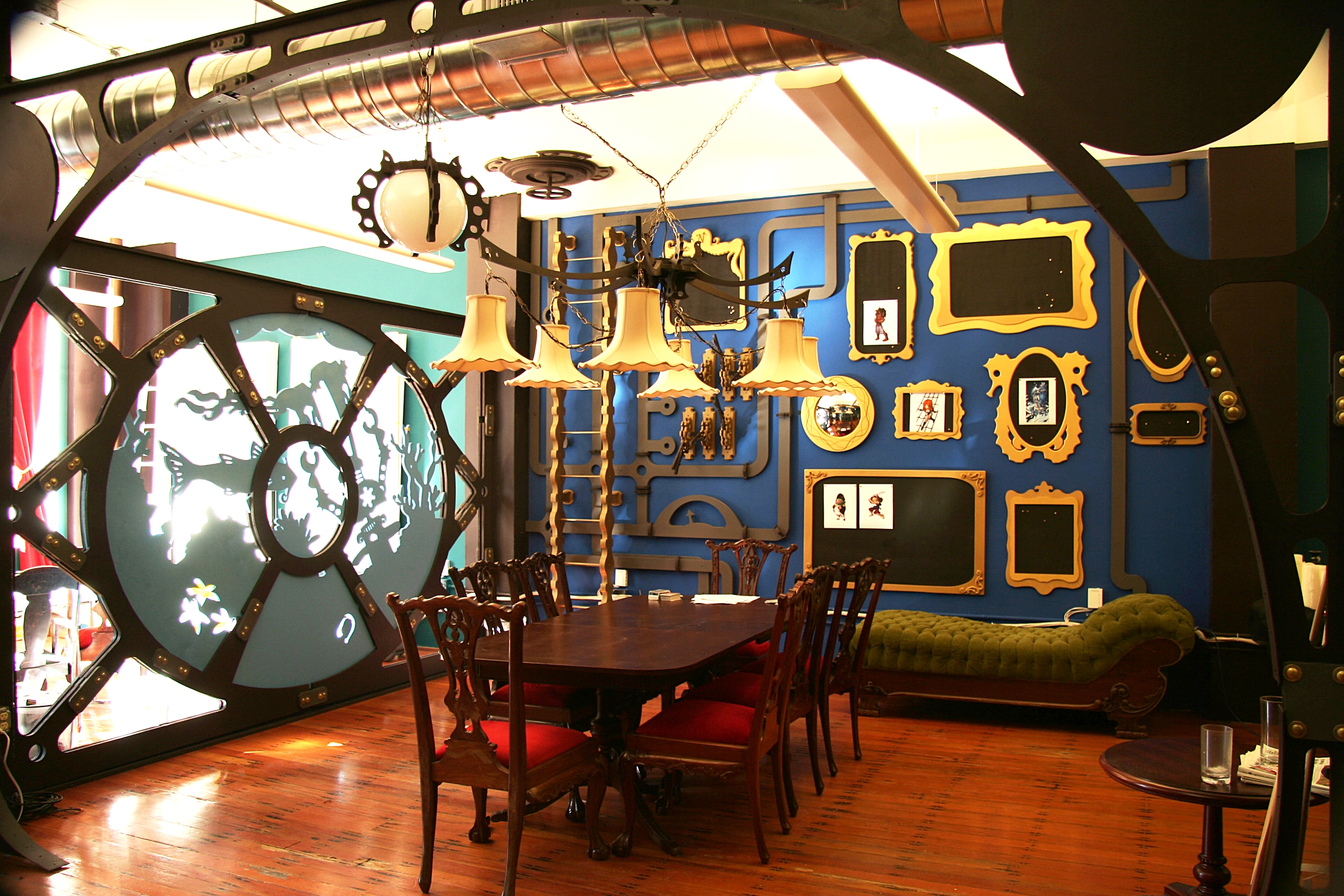 Originally, the back wall was going to host a mock submarine bridge, but Three Rings did not want to sacrifice the work space for a non-functional design element. So, we decided to make a fake ladder and ceiling hatch.