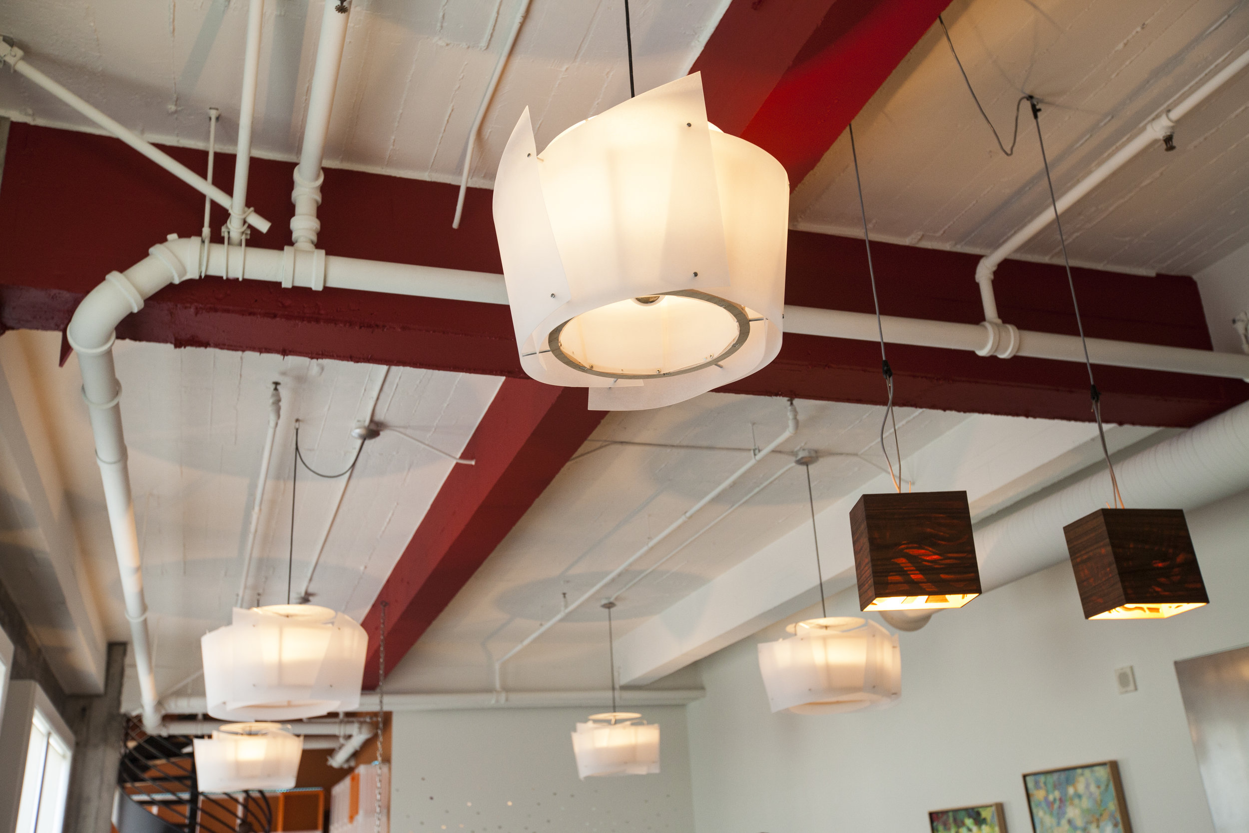  Adding vibrant paint accents to the space softened the harsh industrial feel of this old warehouse loft space. 