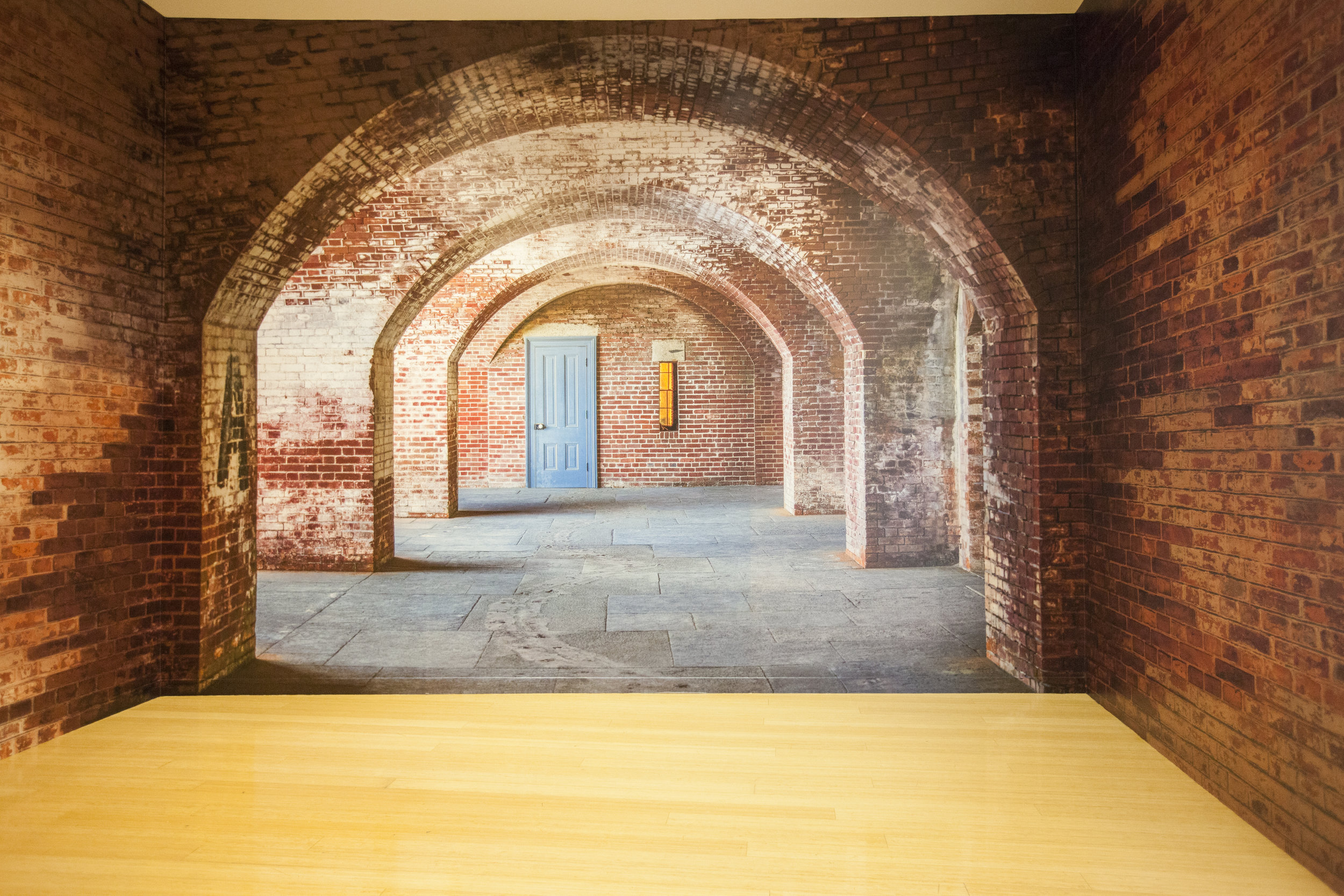 The colors of the office are drawn from this photo, creating a cohesitve feel throughout the space.
