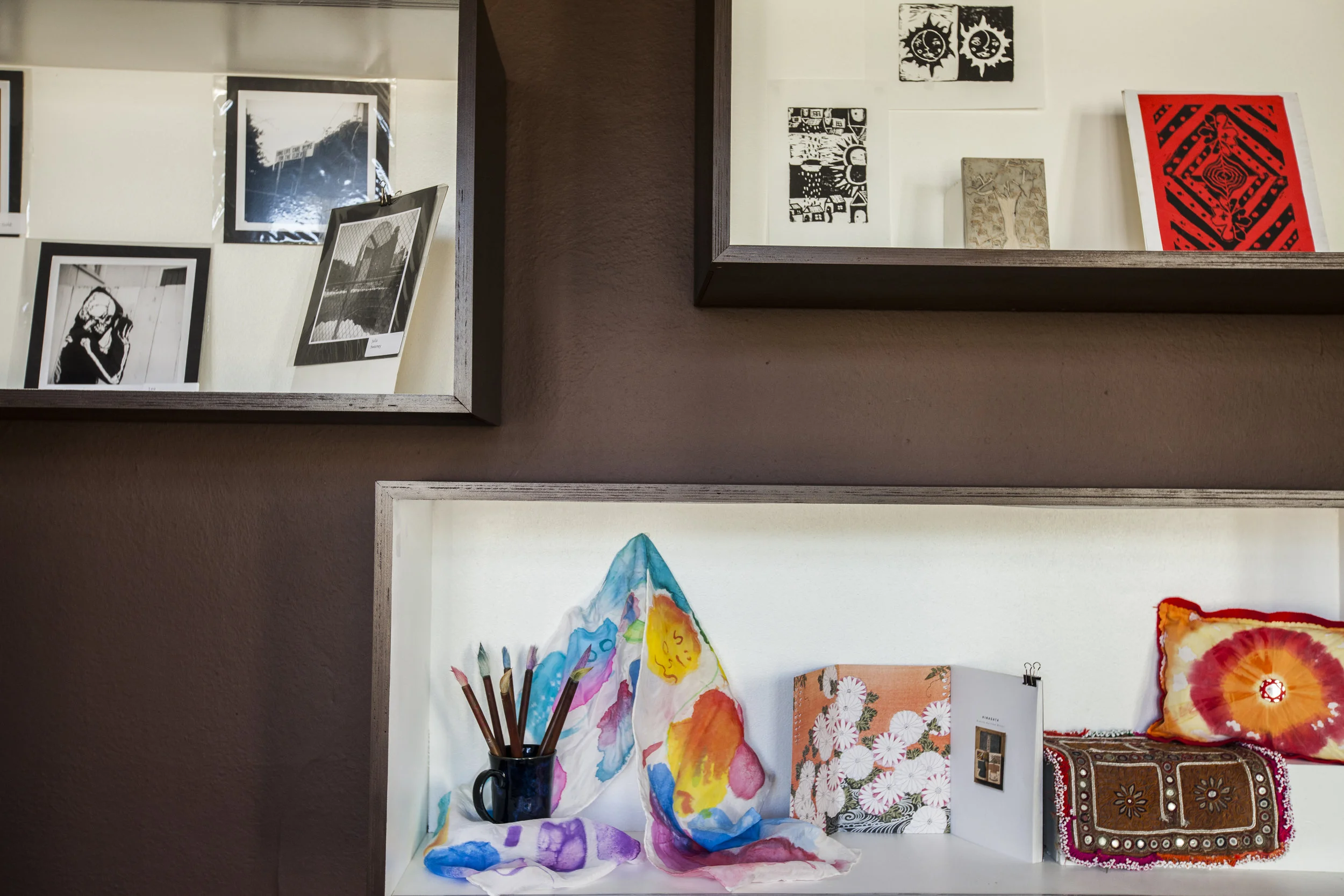  The shelves were quickly filled with the art from the students, now with a great place in the front entry way to show it all off.