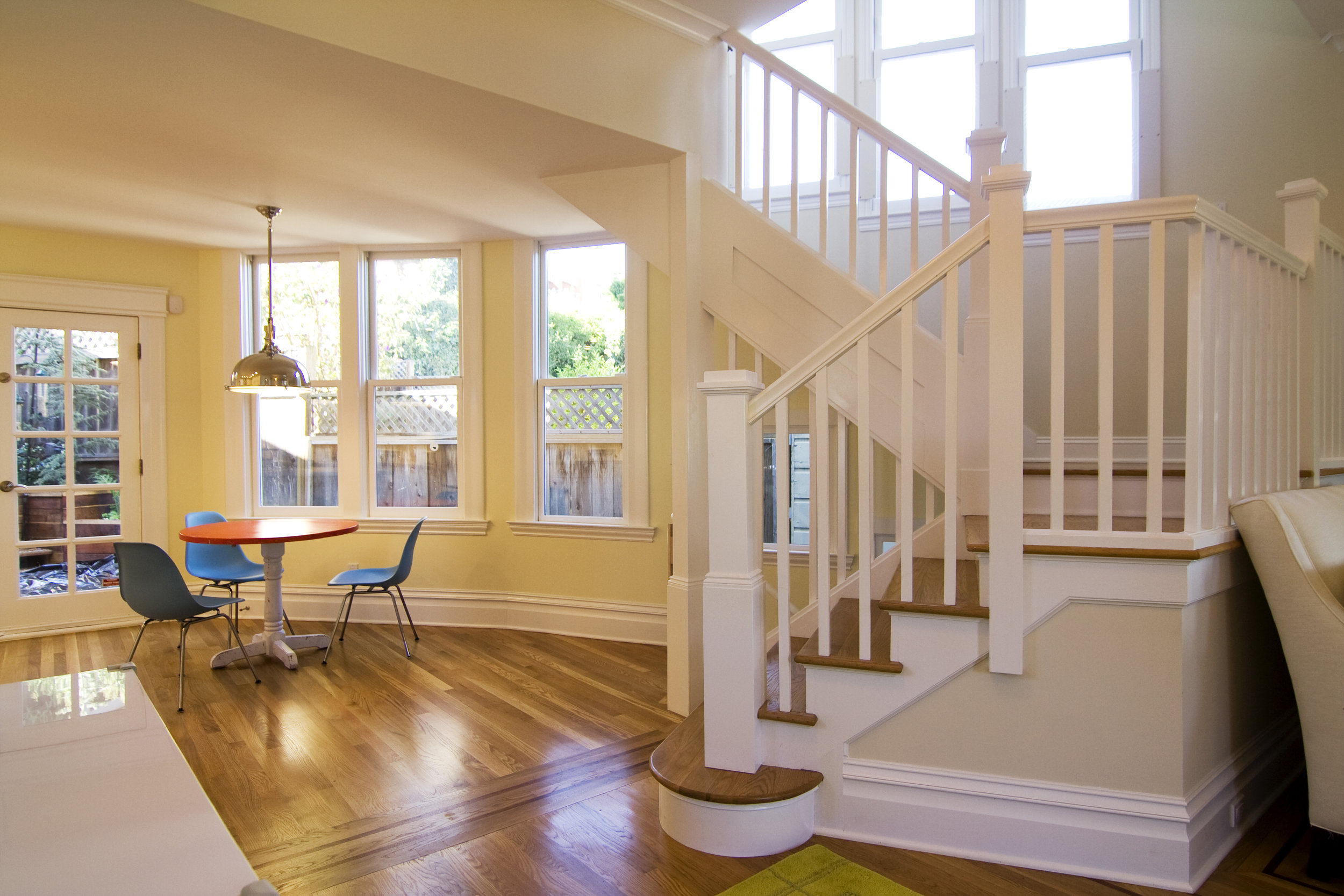 We removed an old closet and added a new beam overhead, which allowed us to dramatically open up the space to include breakfast areas, as well as let more natural light into the home.