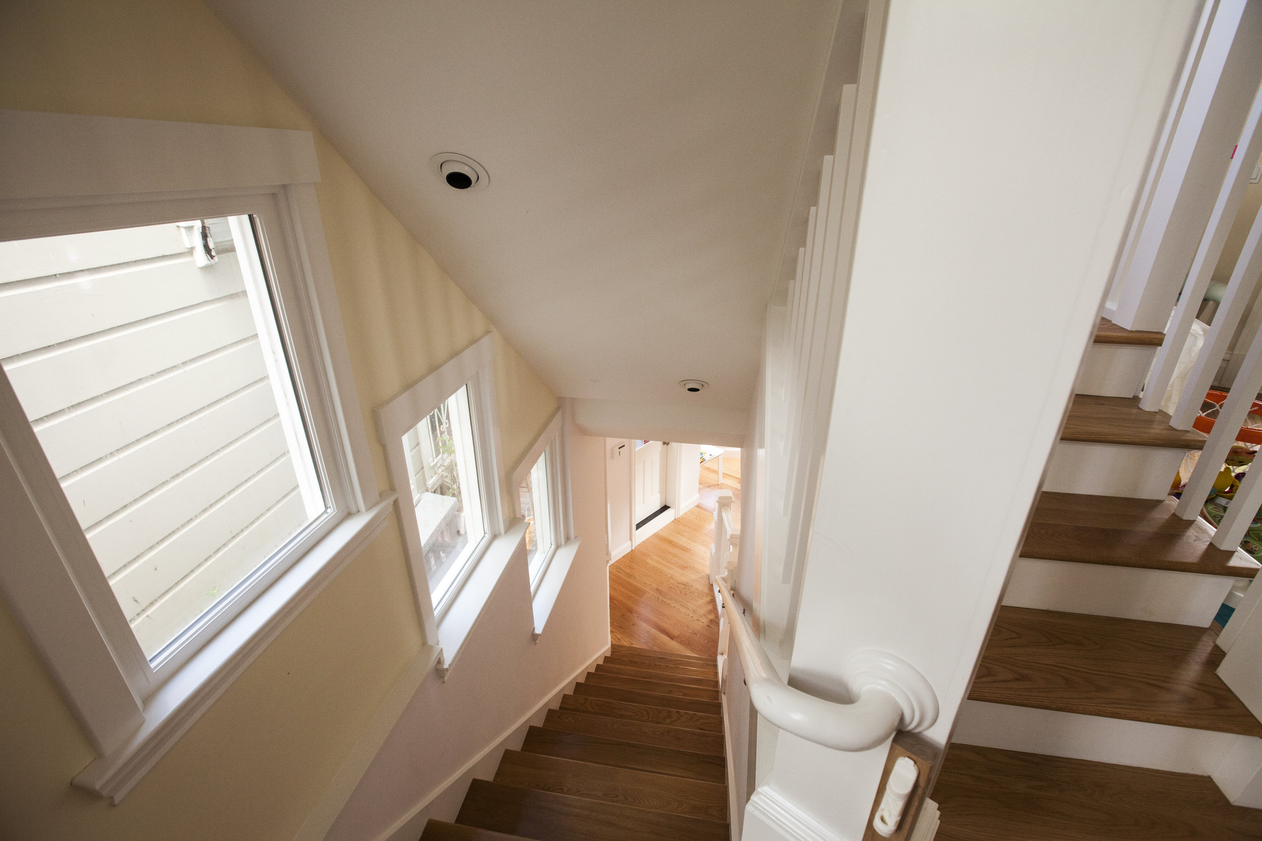  Lots of light was added with windows along the stairway and overhead recessed lighting in the ceiling. 