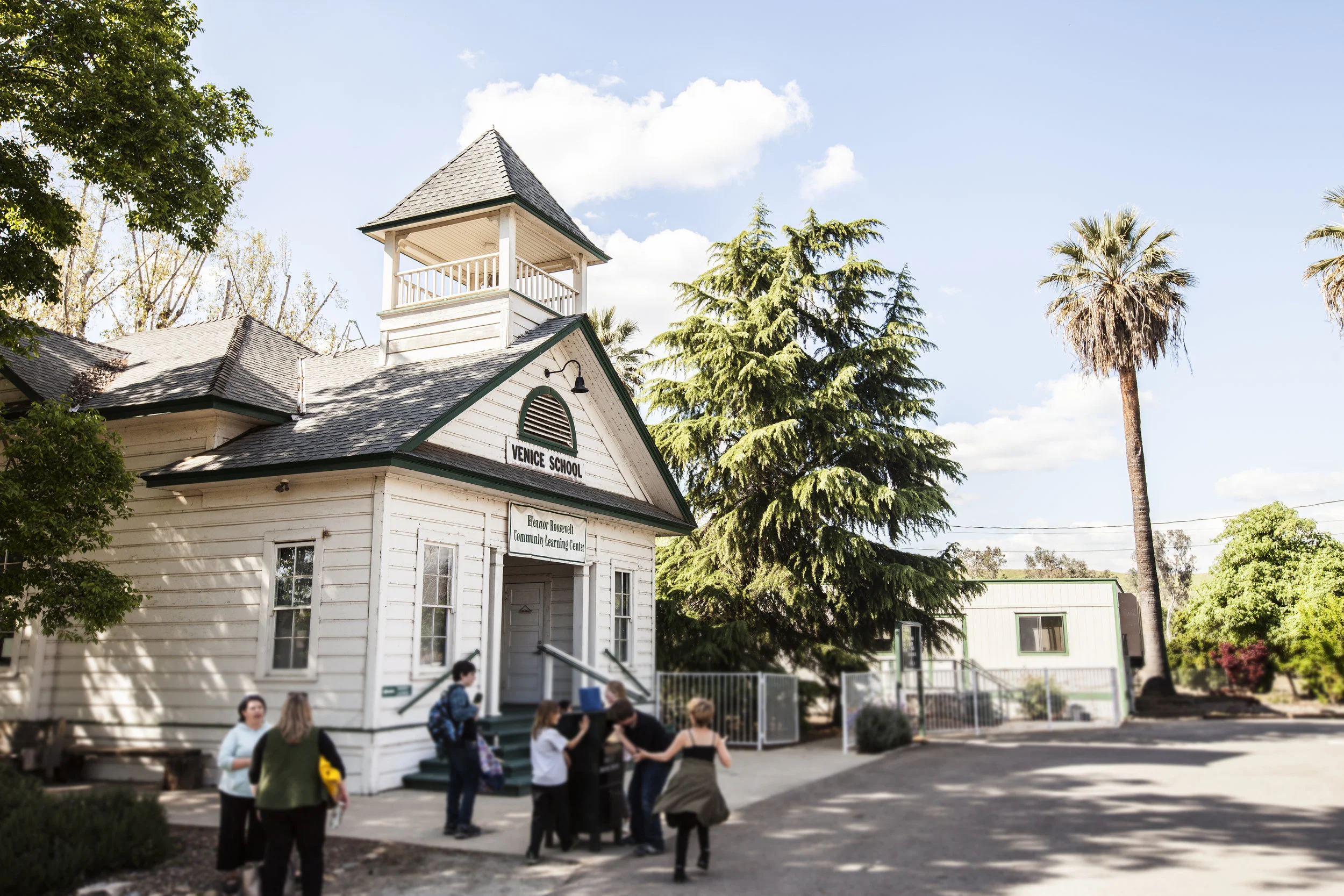 The historic building on site will stay as a landmark and in use as part of the school. The new structures must compliment this building, and though larger, they must not compete with this classic structure.
