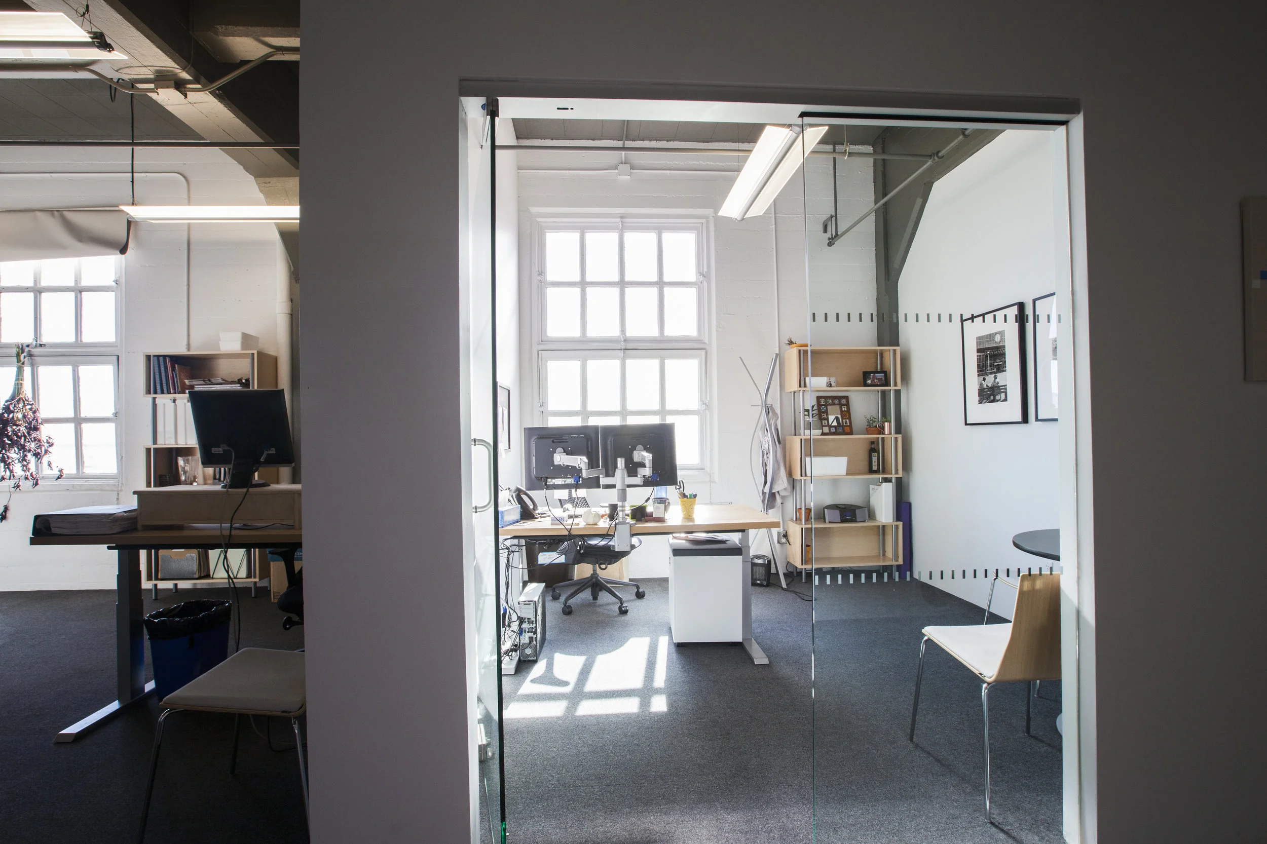 The private offices capture at least one window, making them bright & relaxing places to work.