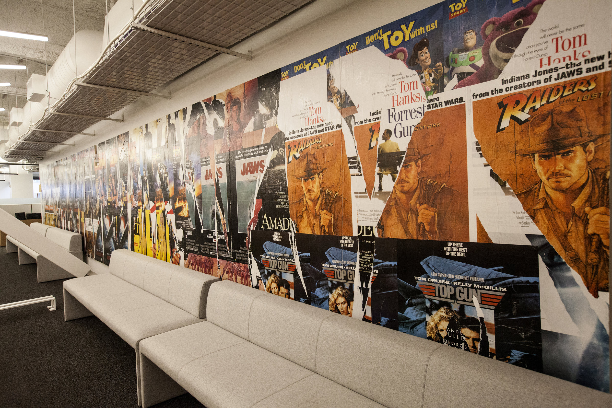  On another floor, a Dolby movie poster paste up wall.&nbsp;We mimicked an urban poster paste up look, using only movie posters from films that used Dolby sound.&nbsp;&nbsp; 