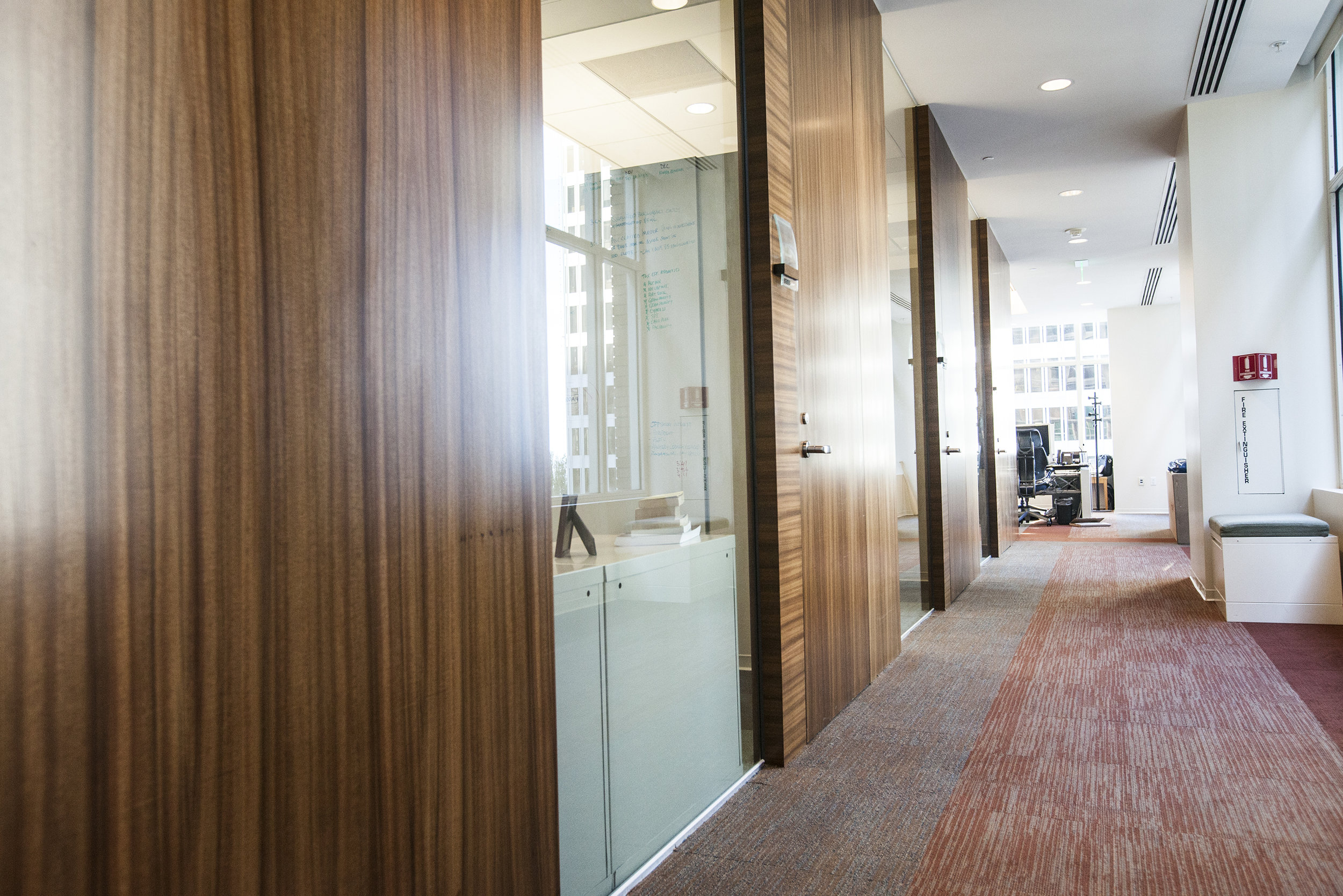 The carpet in place brings new life to the original wooden walls.