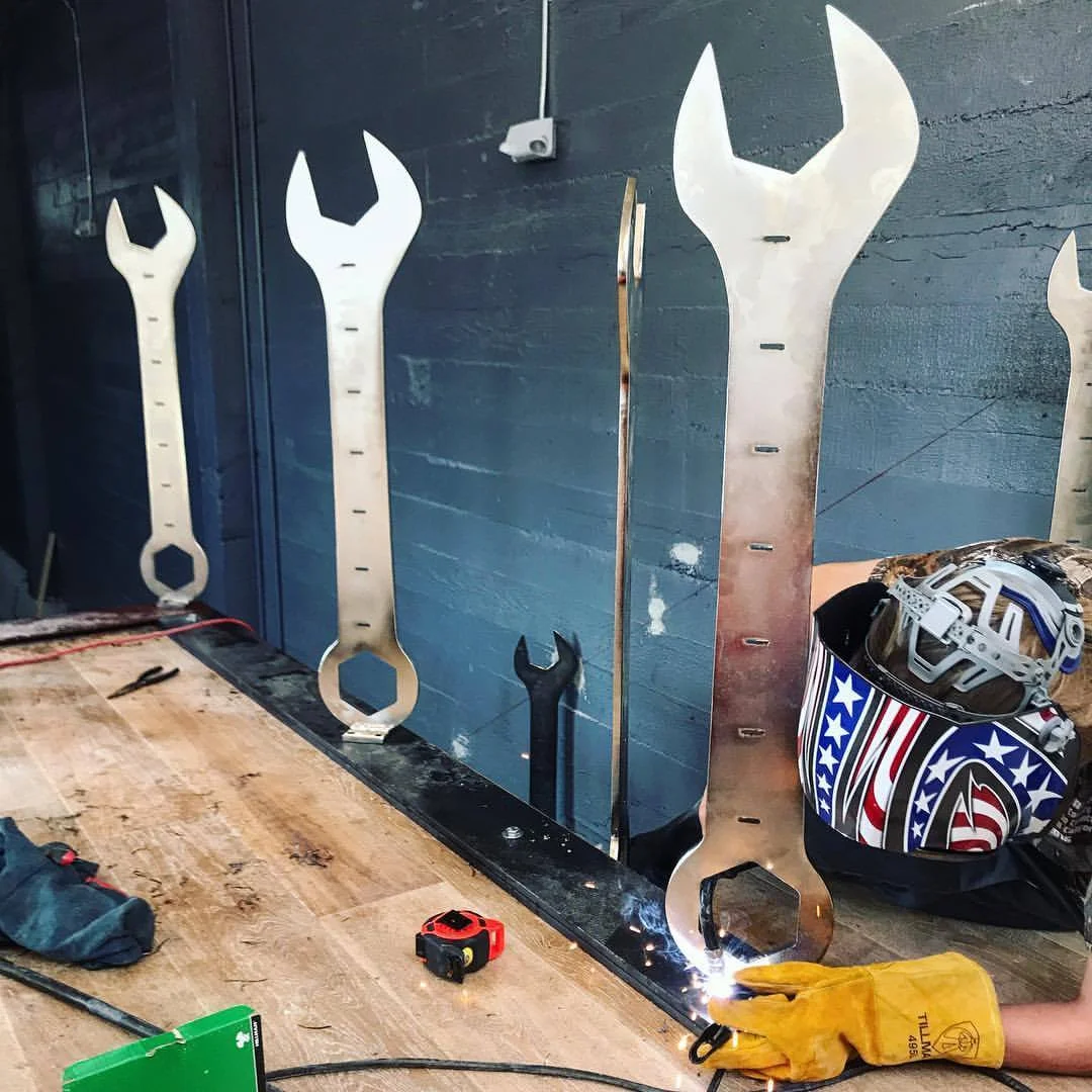 Welding up the wrenches onsite. photo courtesy of Project Wreckless.