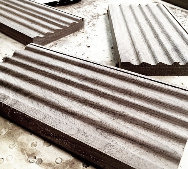 Straight off the cutting table, the shelves are ready for sanding, oiling and the installation hardware.