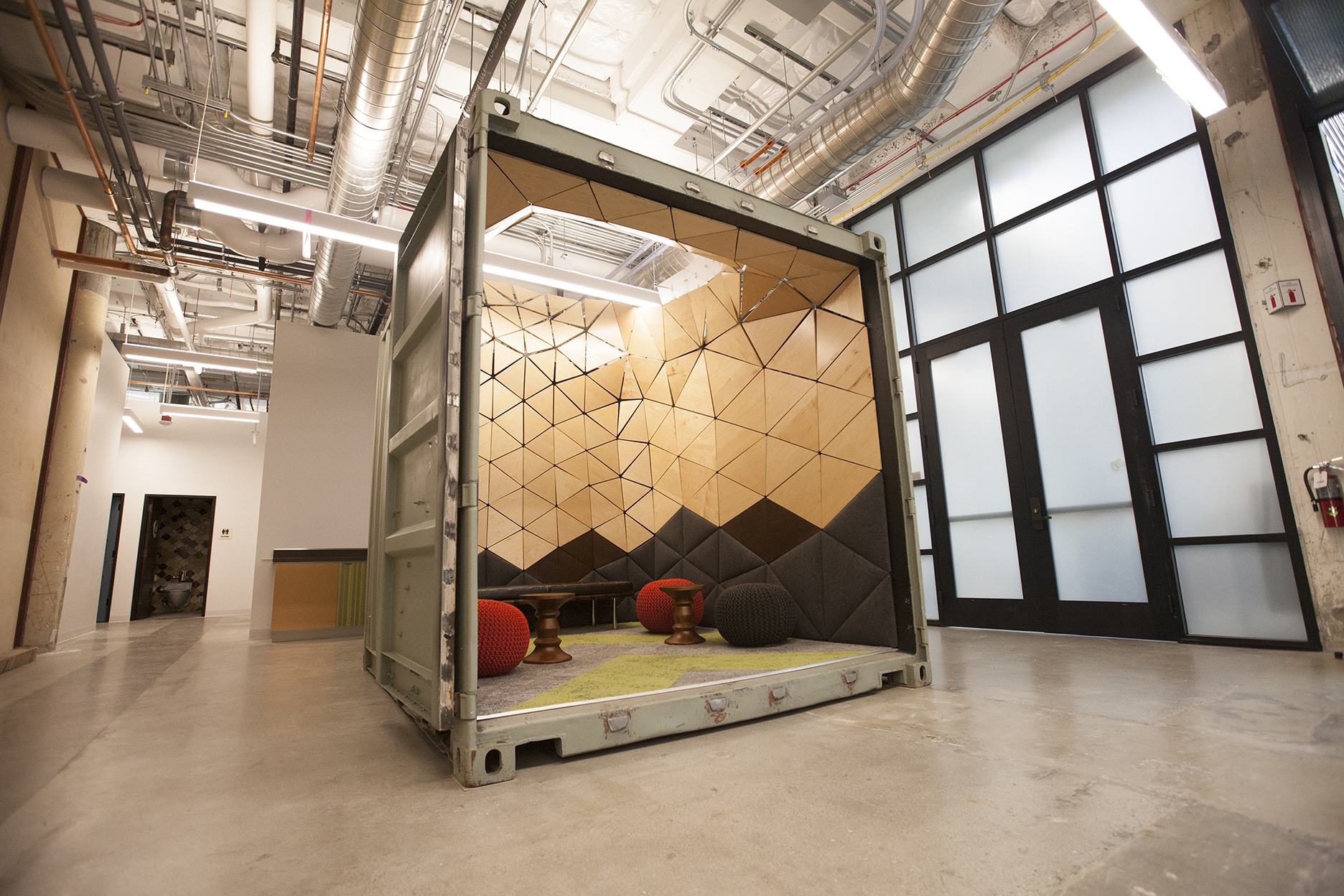  Sitting in its final location in the (then new) GoogleX building lobby, this container lounge is a casual place for people to meet, chat or just hang out. 