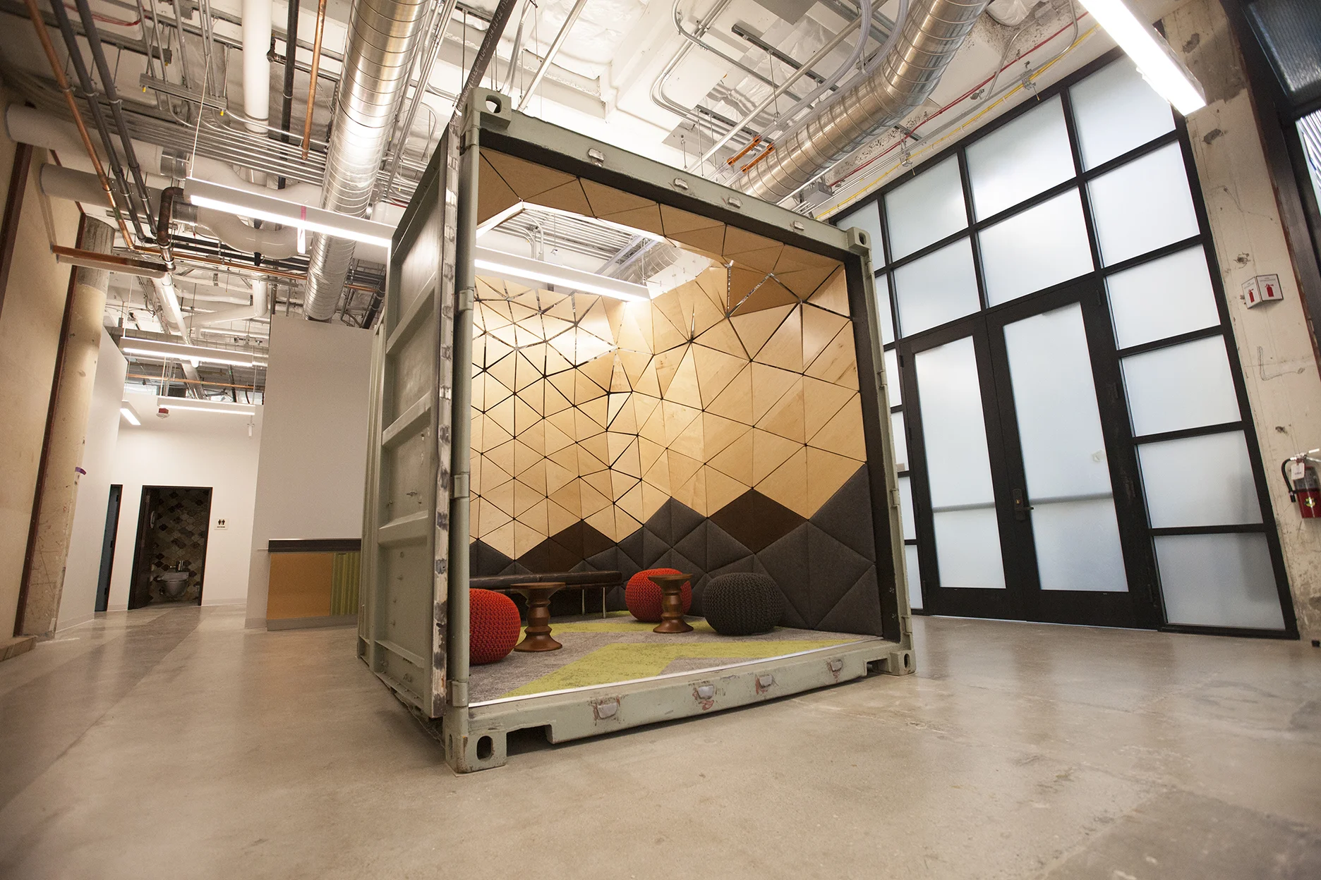 Sitting in its final location in the (then new) GoogleX building lobby, this container lounge is a casual place for people to meet, chat or just hang out.