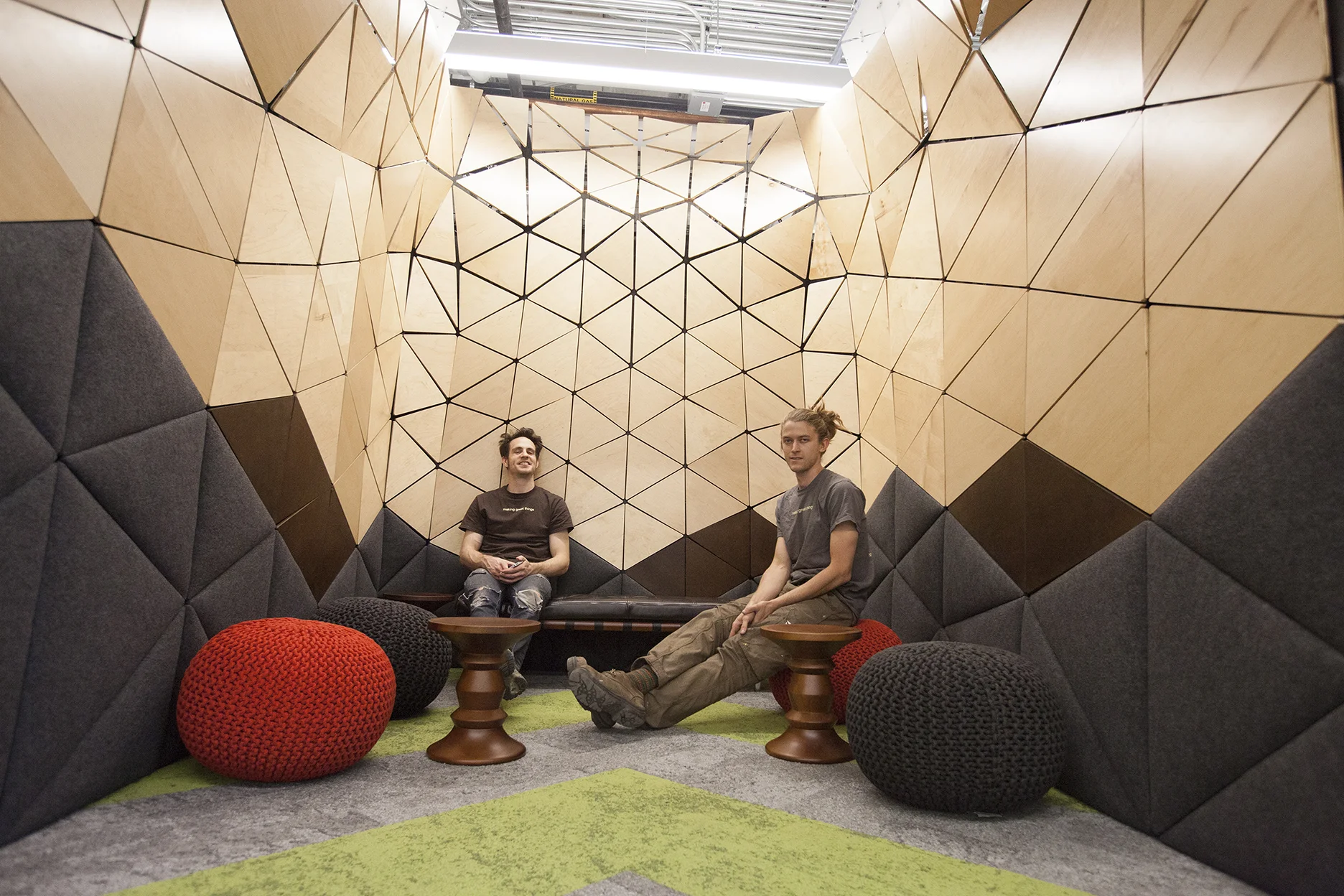 Joel and Jacob, two BWC lead fabricators, pose inside of their work.