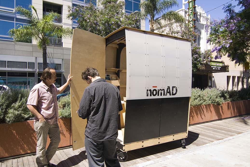 Side door access allows different configurations for the rolling gallery / kiosk.