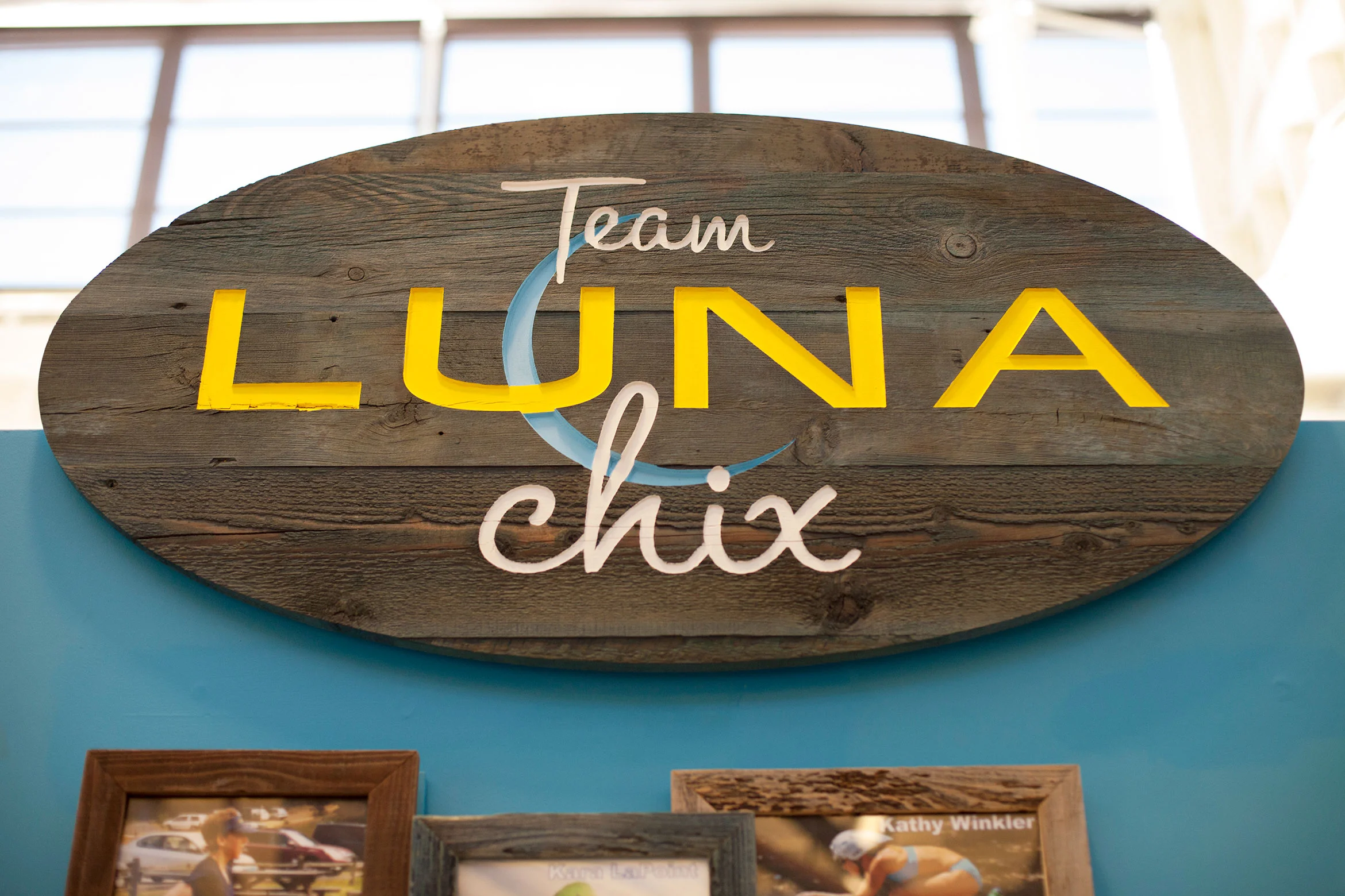 The final Team Luna Chix sign, made on reclaimed boards that were dyed, carved and painted, was exactly the style they wanted.