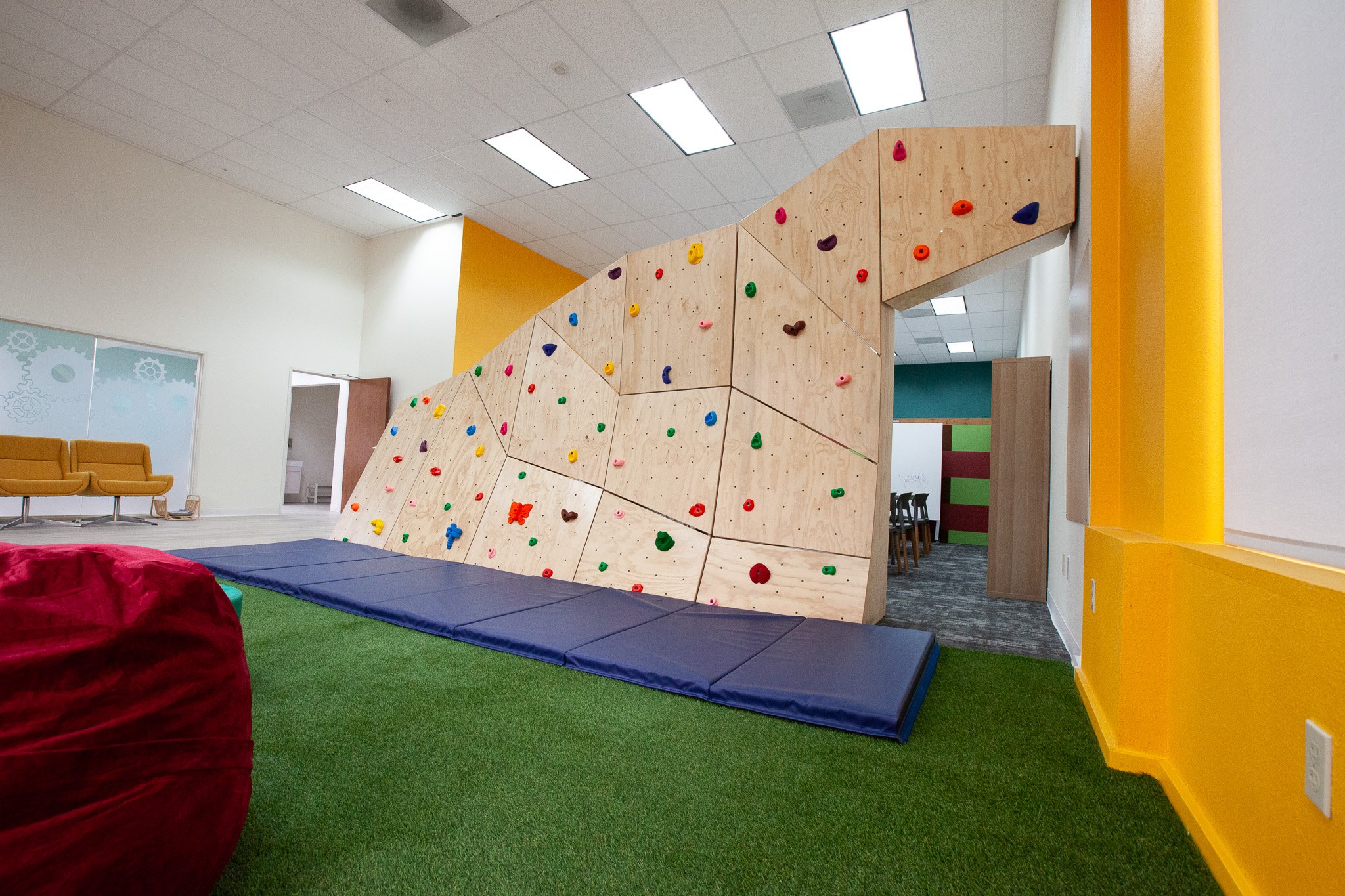 Climbing Wall bookcase for a small school