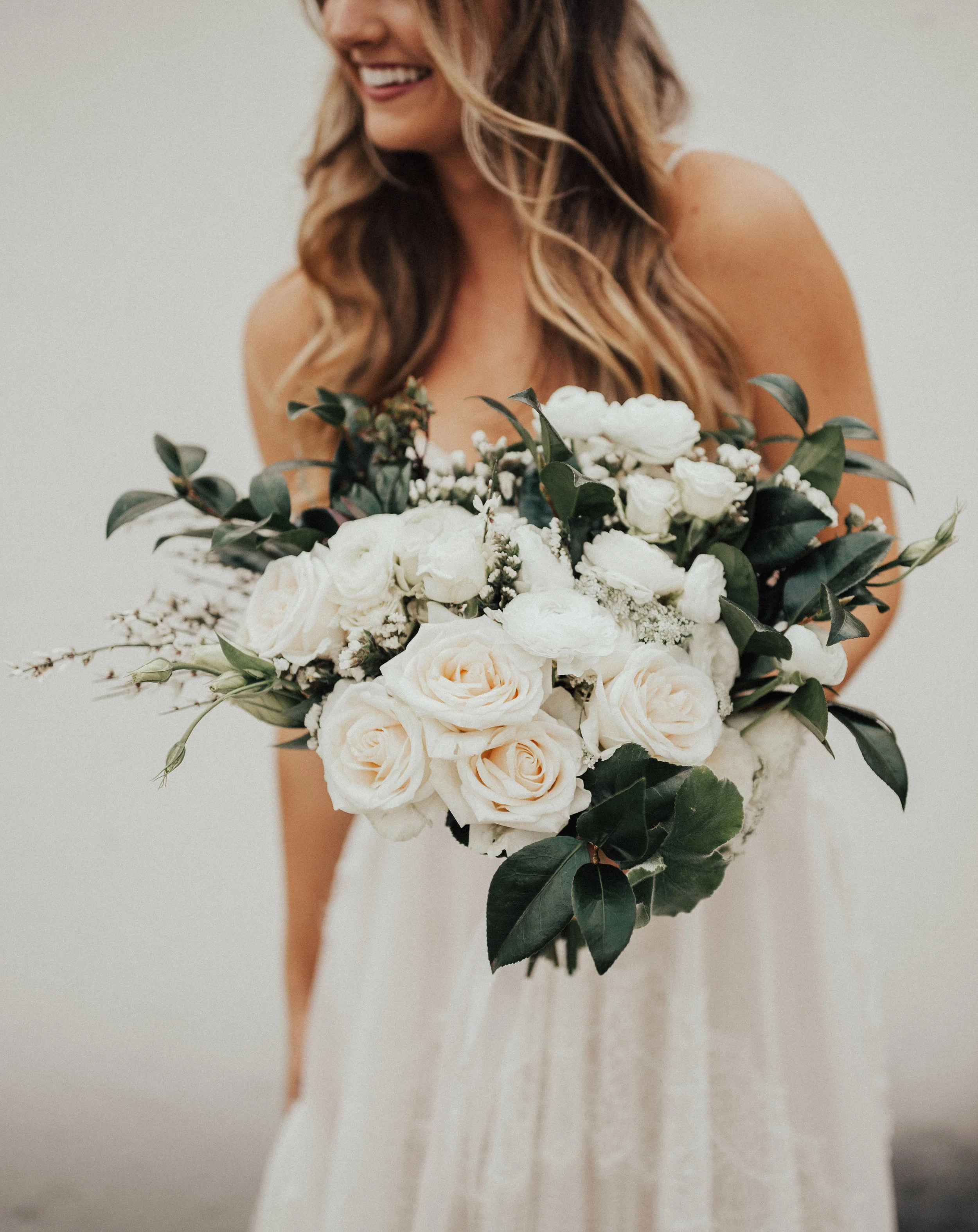 Medium Round Garden Bouquet Style: textured Details: roses, raunuculus, greenery {Photo courtesy of Christy Johnson }