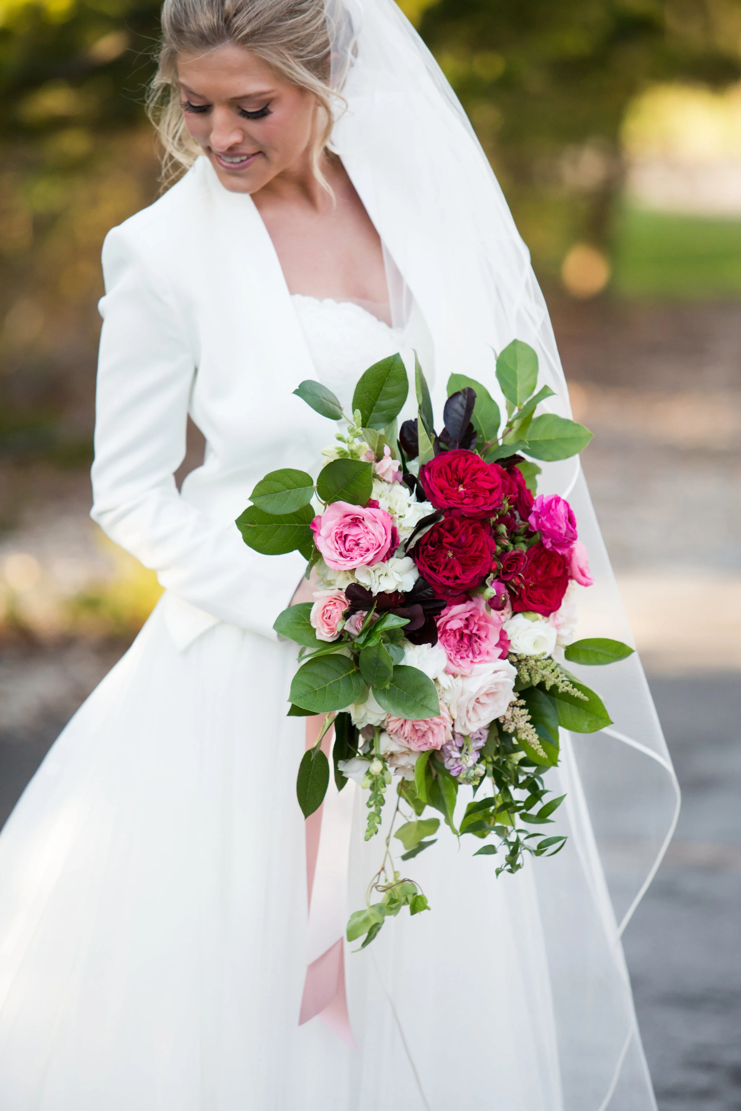 Cascade Bouquet Style: romantic, garden Details: garden roses, art deco roses, draping ribbon, snapdragon, green greenery {Photo courtesy of Melissa and Beth }