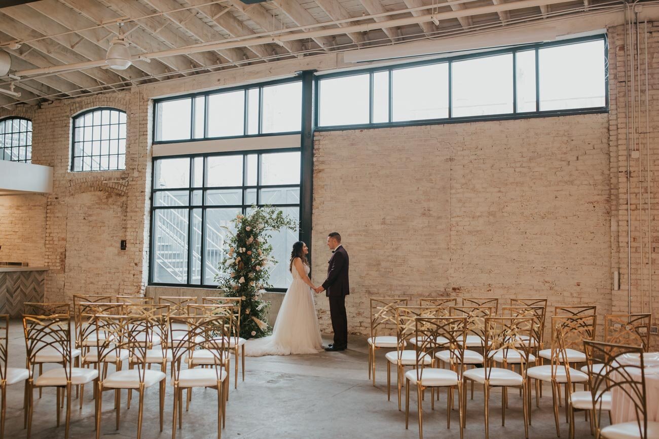 Downtown-Kansas-City-Wedding-Venues-The-Abbott-white-washed-brick-walls.jpg