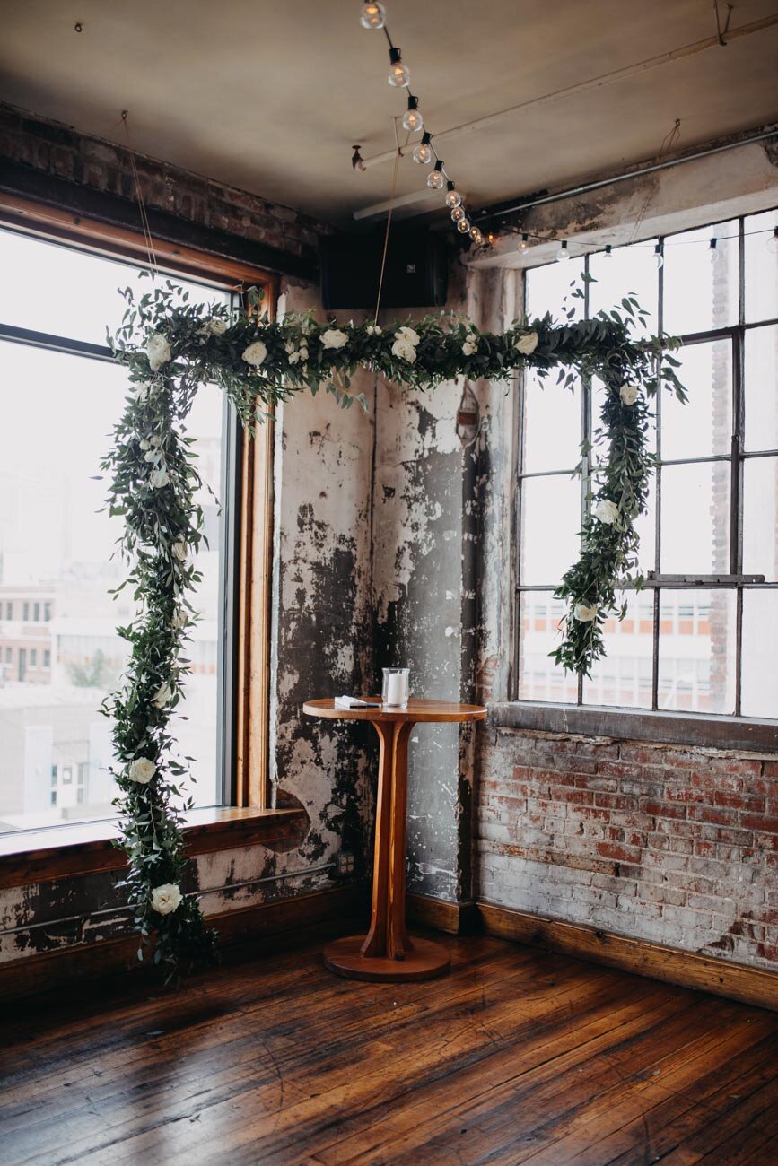 Downtown-Kansas-City-Wedding-Venues-The- Bauer-Ceremony-Hanging-Garland.jpg