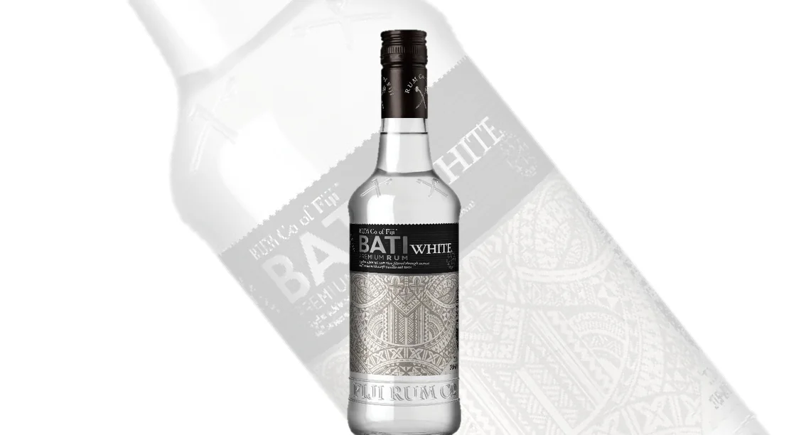 FIJI RUM CO. - BATI WHITE LIKE NOWHERE ELSE ON EARTH, FIJI’S PRISTINE ENVIRONMENT BOASTS A MAGNIFICENT MOUNTAINOUS LANDSCAPE, DRENCHED WITH EQUATORIAL SUNSHINE AND WARM SEA BREEZES. OUR WATER IS RENOWNED AS SOME OF THE WORLD’S PUREST, WHILE OUR SUGAR CANE IS GROWN IN ANCIENT VOLCANIC SOIL AND WARM FIJIAN CLIMATE, THEN EXPERTLY HAND-CUT BY THOUSANDS OF INDEPENDENT FIJIAN FARMERS. A CLEAR AND BRIGHT RUM AGED FOR 2 YEARS IN LARGE WHITE OAK VATS. GENTLY FILTERED THROUGH COCONUT SHELL CARBON TO ENSURE IT RETAINS THE FRESH, CITRUS AROMA AND SOFT VANILLA OAK TASTE.