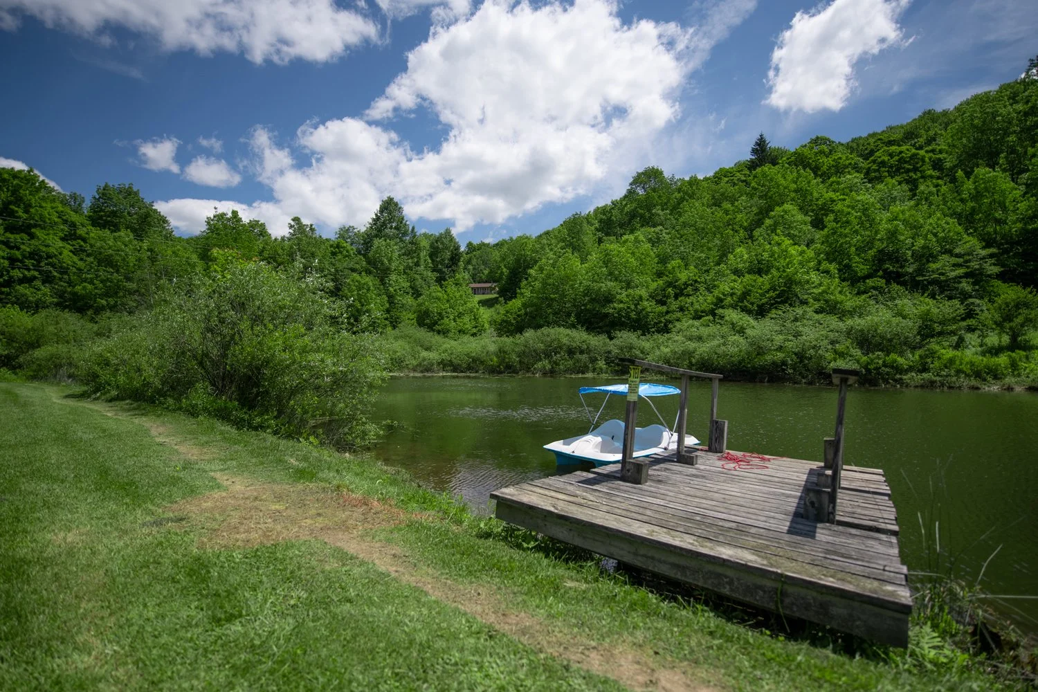 03 ext-pond-boat-and-dock-and-house.jpg