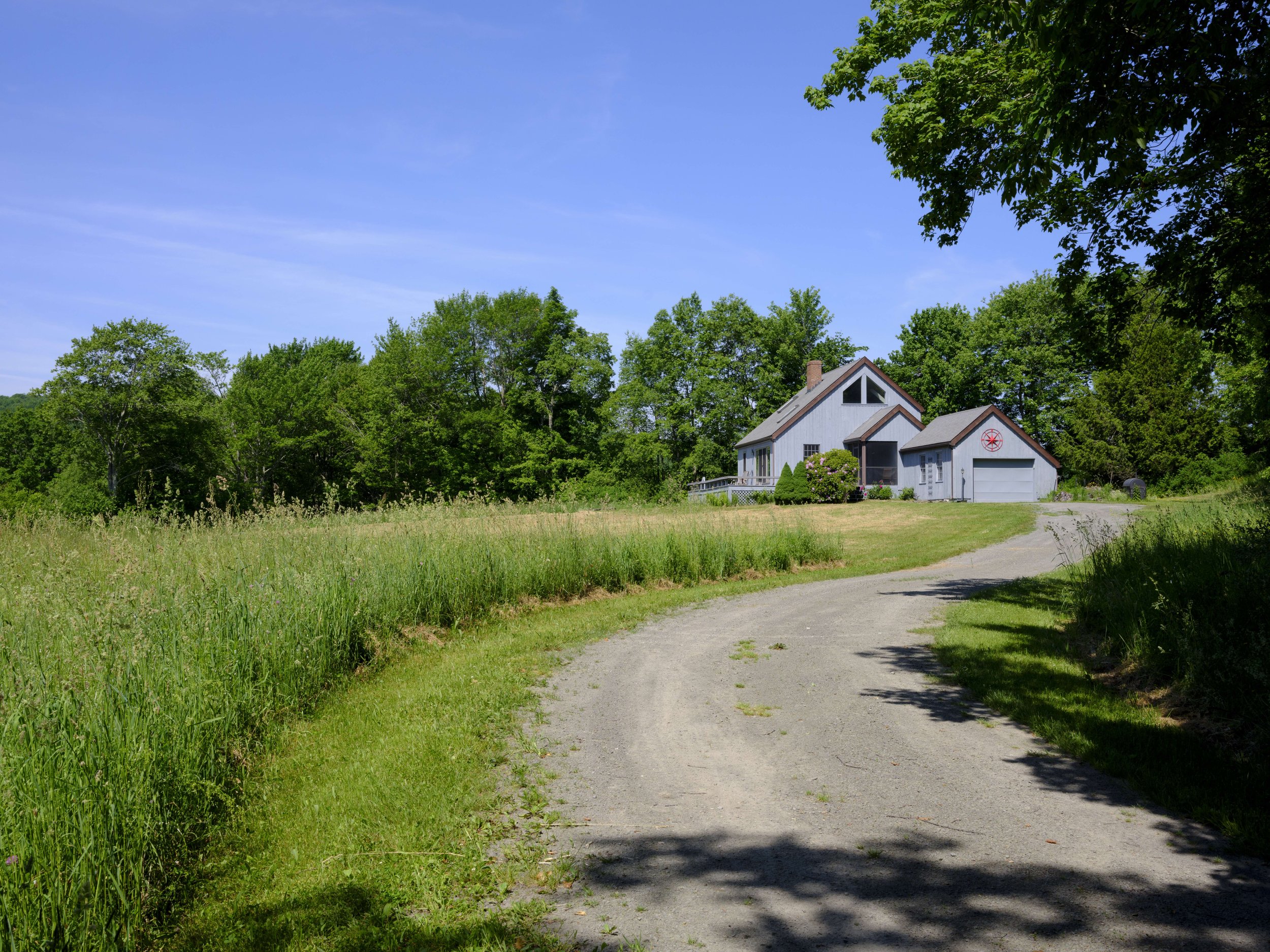 16 driveway view of house.jpeg
