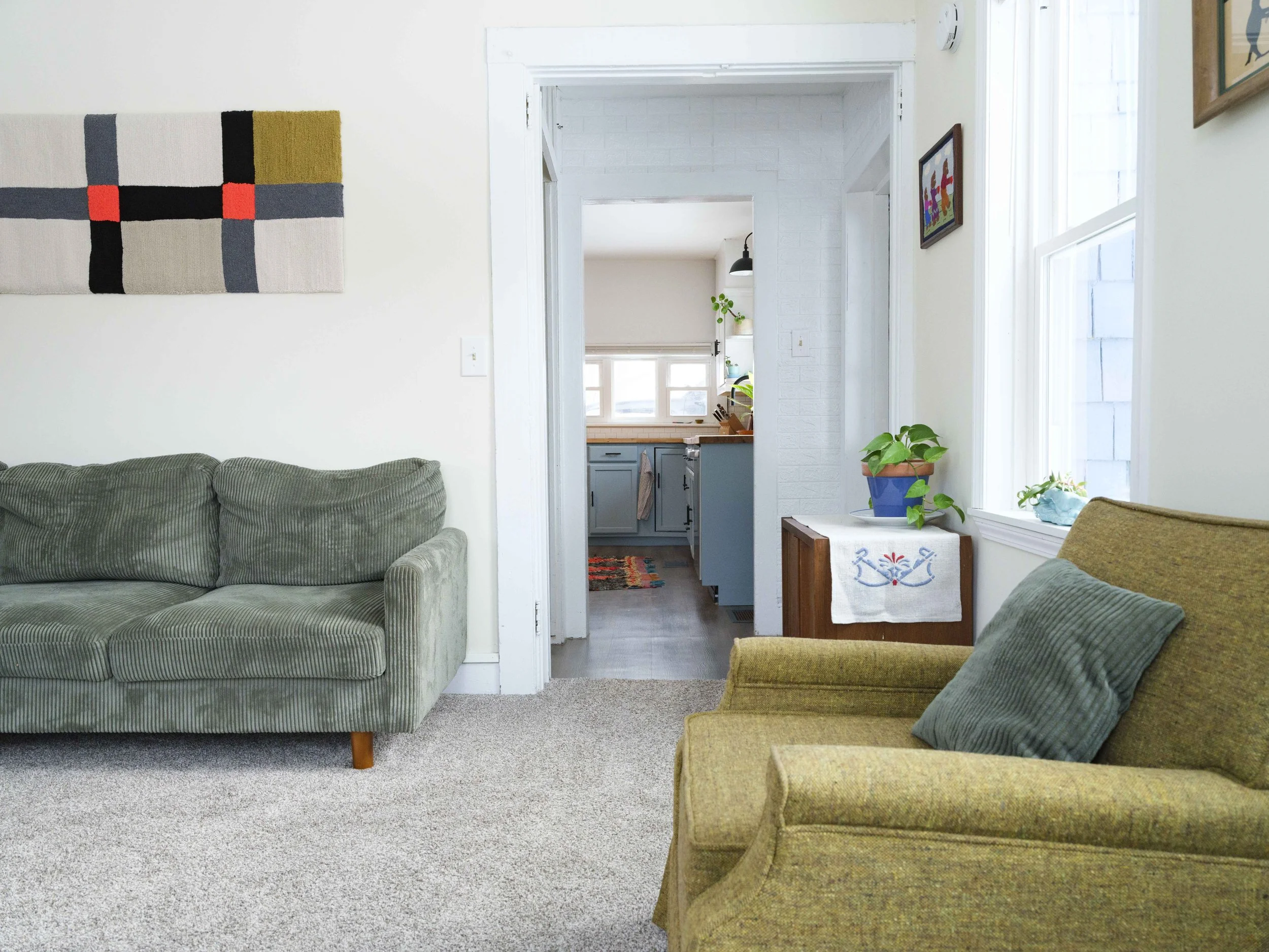 07 couch towards kitchen.jpg