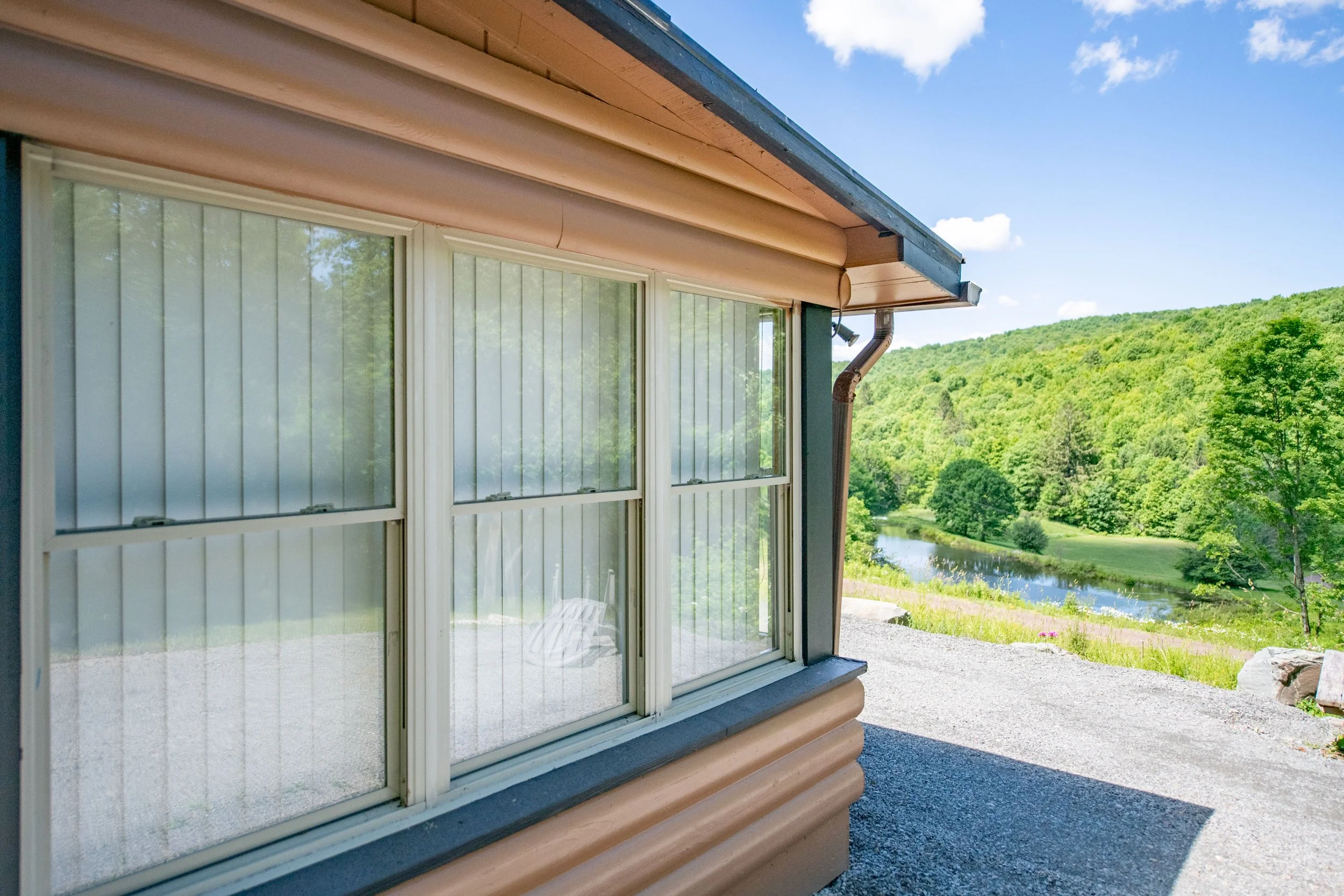 04-corner-of-house-and-pond.jpg