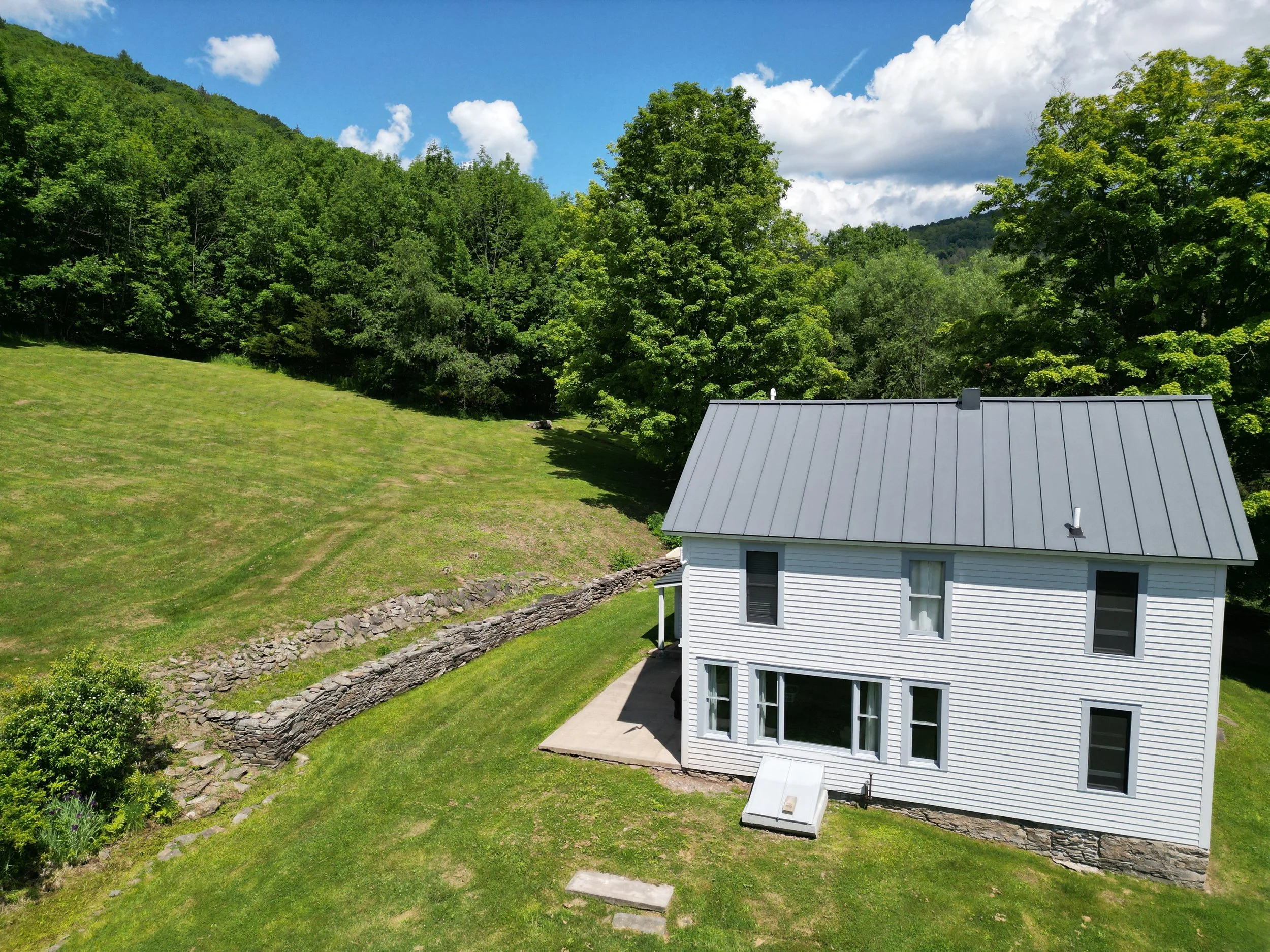 back side of house and lawn.jpg