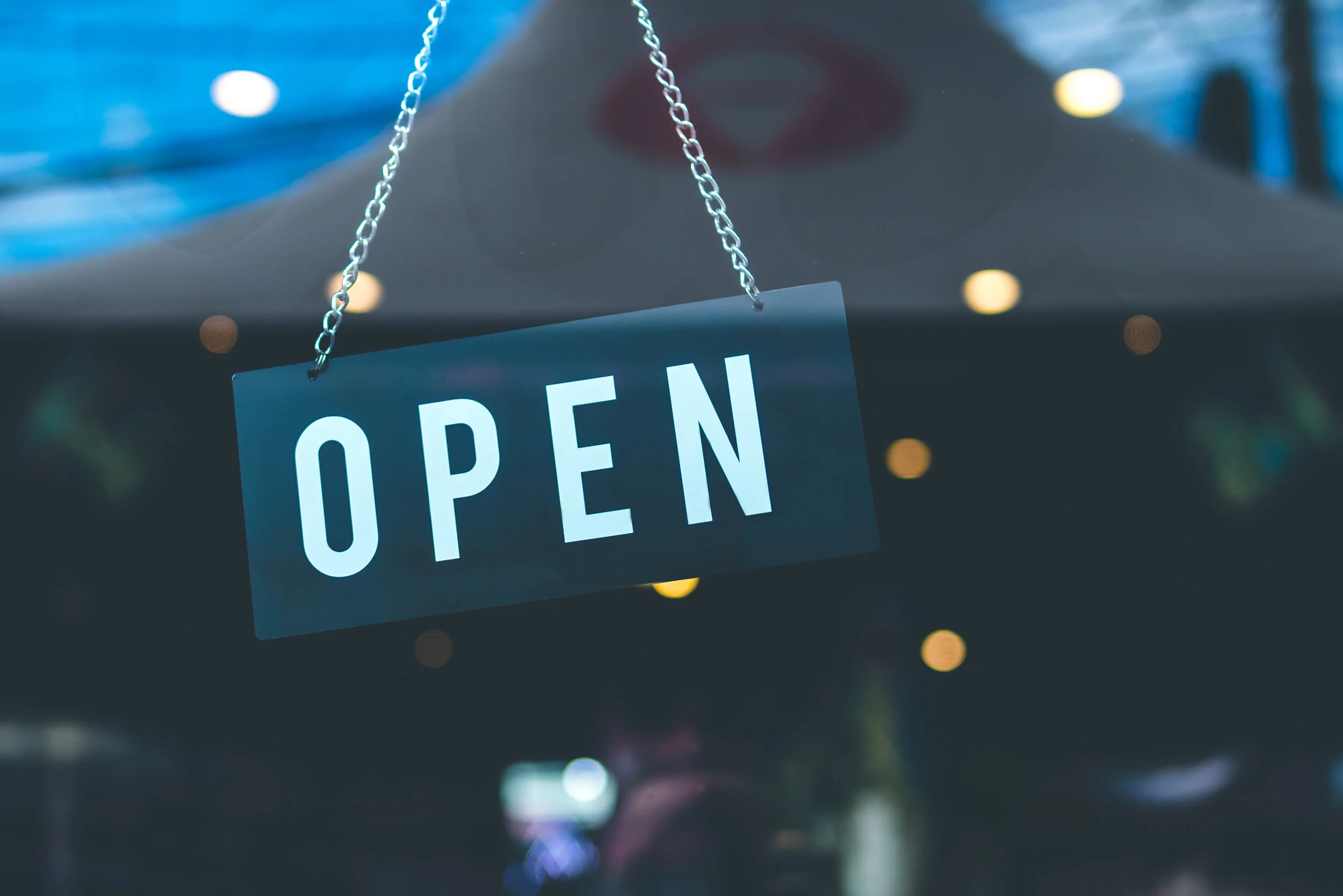Canva - Selective Focus Photography of Open Signage.jpg