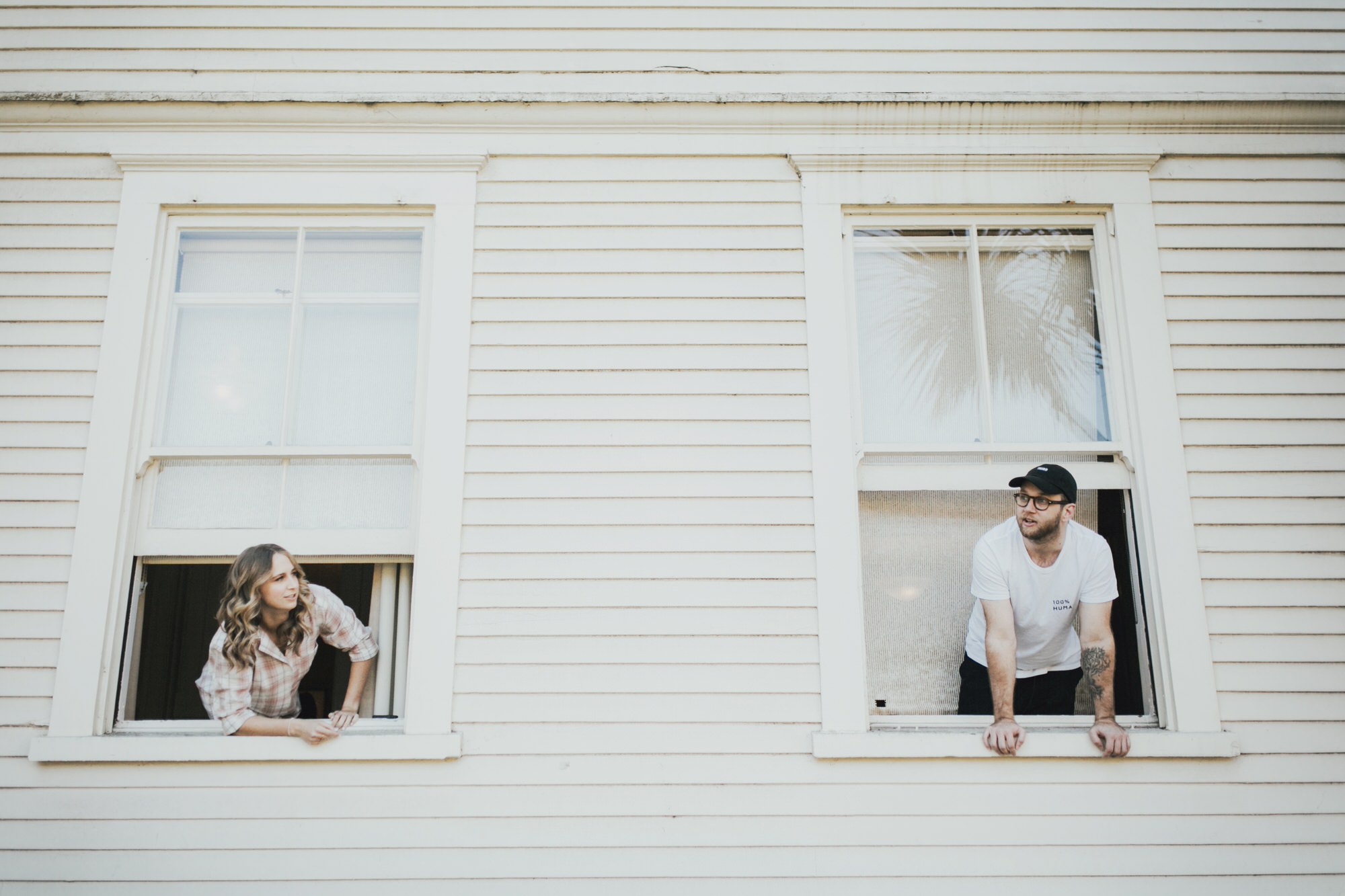 Documentary Style Wedding Photography of bridal party talking before wedding ceremony