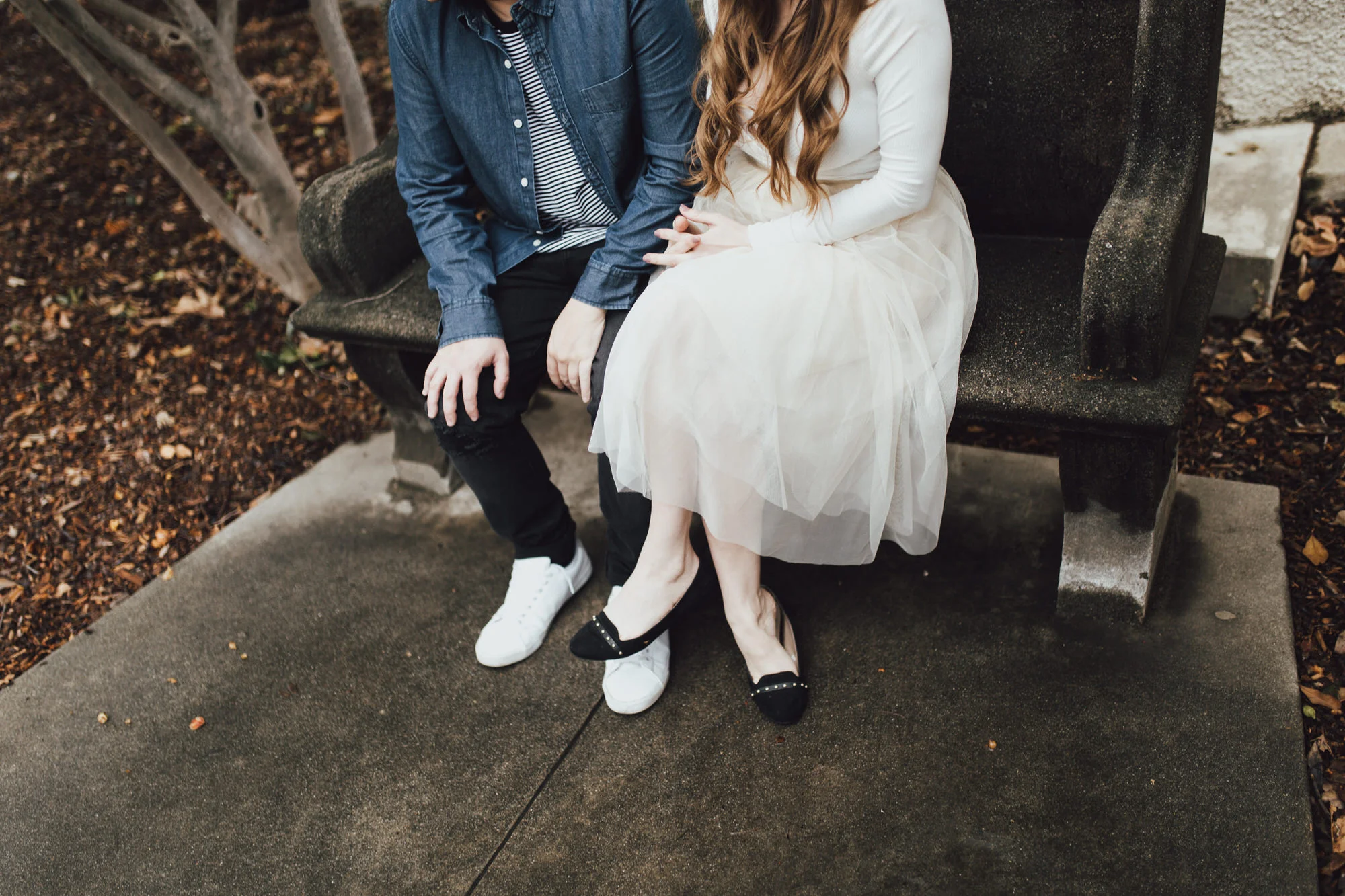 vanessa and ryan sitting on a bench