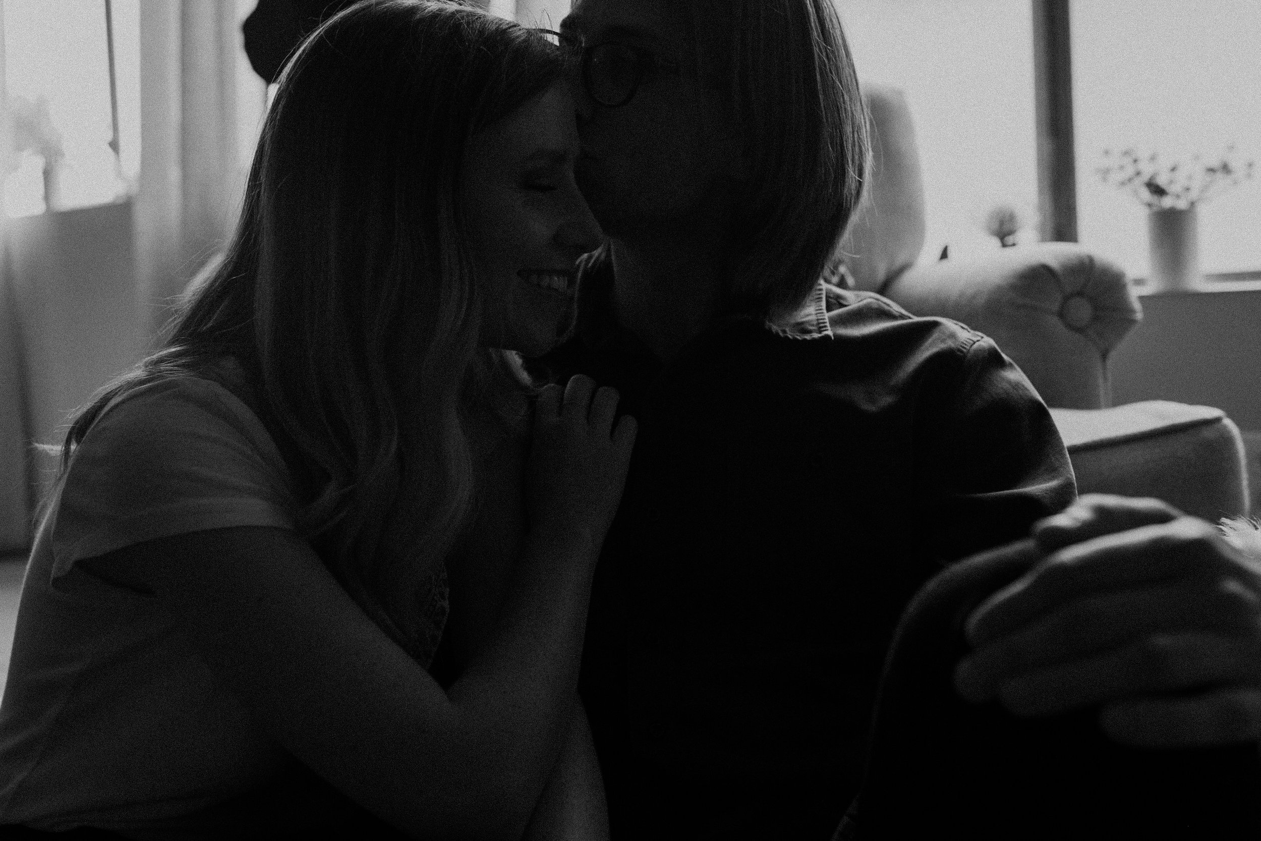 moody engagement photos indoors