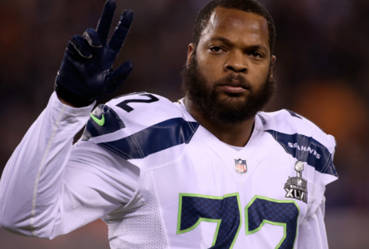 Seattle Seahawks superstar defensive end Michael Bennett Explains Why He Will Sit during the National Anthem this Coming Season