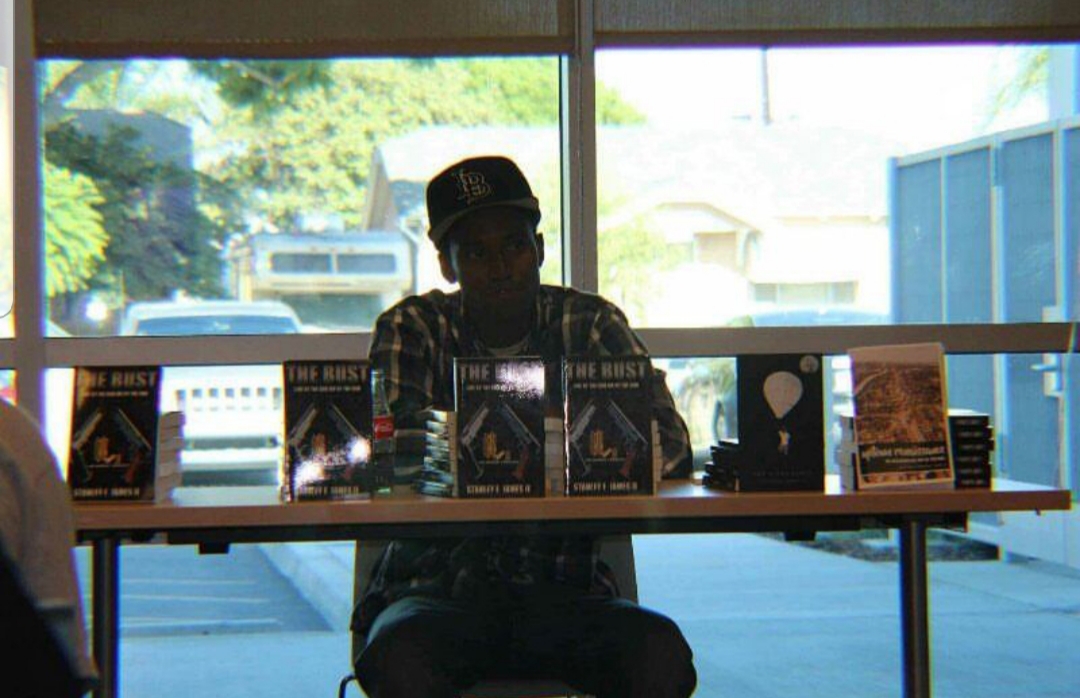 Stanley James II” Is from the North Side of Long Beach , California former member of a Crip Organization and went by the name “ BabyFace”. Stanley has completely transitioned his life completely from serving time in and out of jail, throughout his entire teens. James decided to leave the drug game and solely commit to writing fictional novels professionally. James used his drug money to self fund his Craft, and invested into fully learning the business. As James continued to grow he met mentors and gained several relationships which put him in position to publish his first book, “The Bust” (Live by the gun die by the gun) which was joint published through “No Brakes” based out of Los Angeles In August 2017. During the Process of Getting his first novel James faced a few unfortunate events losing three best friends to murder. Since then James released his second novel “True 2 the Streets” with Keisha Williams In August 2018. James Is currently In the works of shooting a short film based on his books and poetry. Stanley has sold over twenty-five thousands books worldwide. James Is also about to release his newest project “Escobar’s Revenge” sometime In 2019. Stanley James II Is the Author of the streets soon to be International stay connected!!