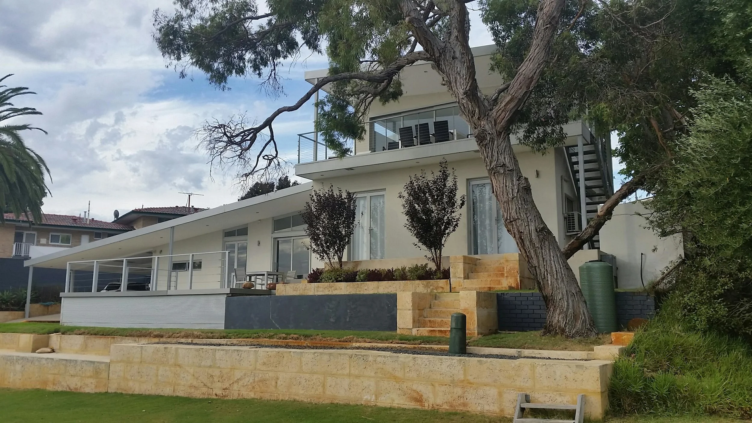 After: The home now has ocean views with the addition of a new level and balcony.