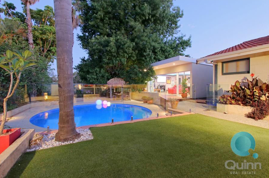 The man cave addition opens out to access the swimming pool area.