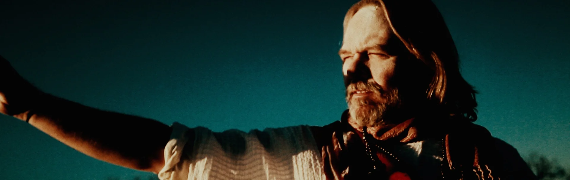 GuruReachingOut thin.jpg