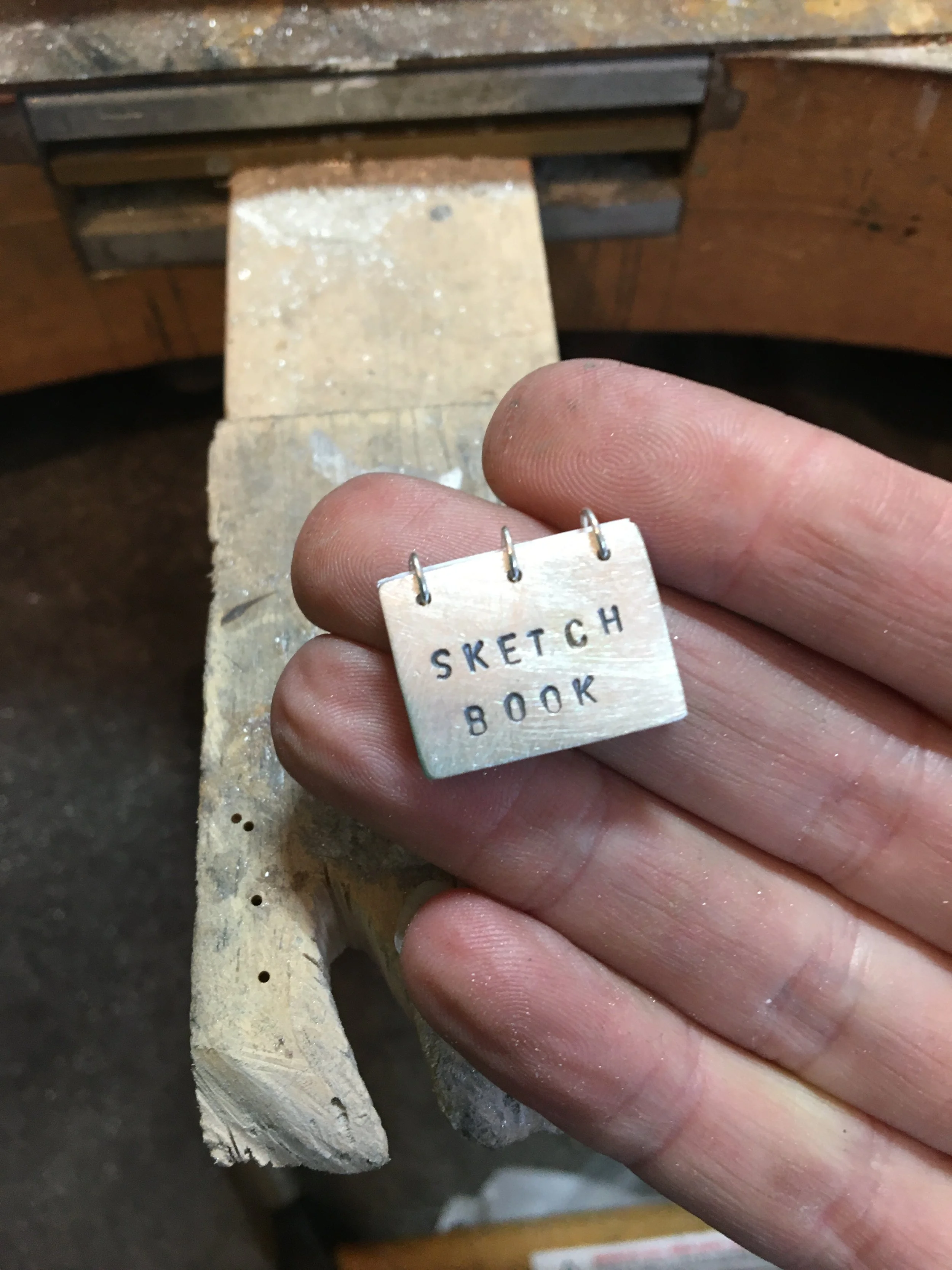 Tiny sketchbook with paper pages