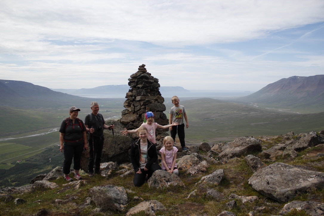 With Grandma and Grandpa at the cairn in Gvendarskál