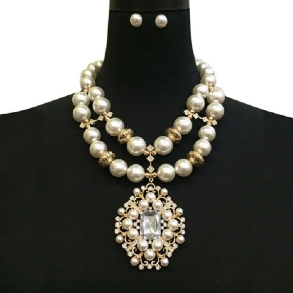 LARGE CREAM PEARL BEADED GOLD STATEMENT NECKLACE WITH UNIQUE PENDANT.jpg