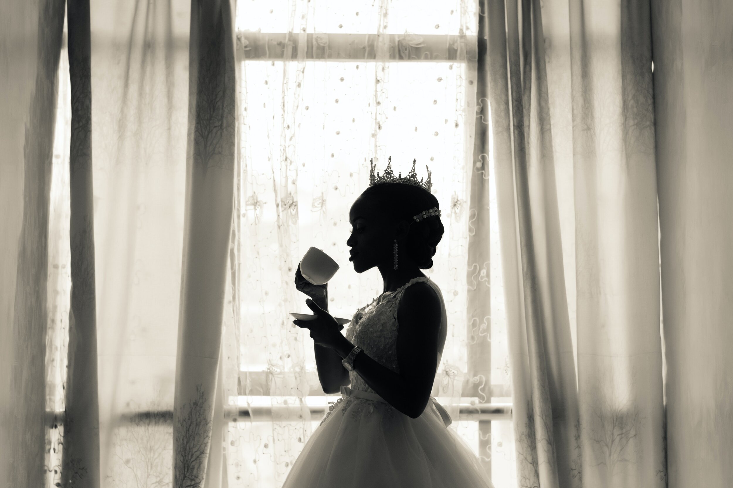 woman-in-white-wedding-gown-holding-cup-1025945.jpg