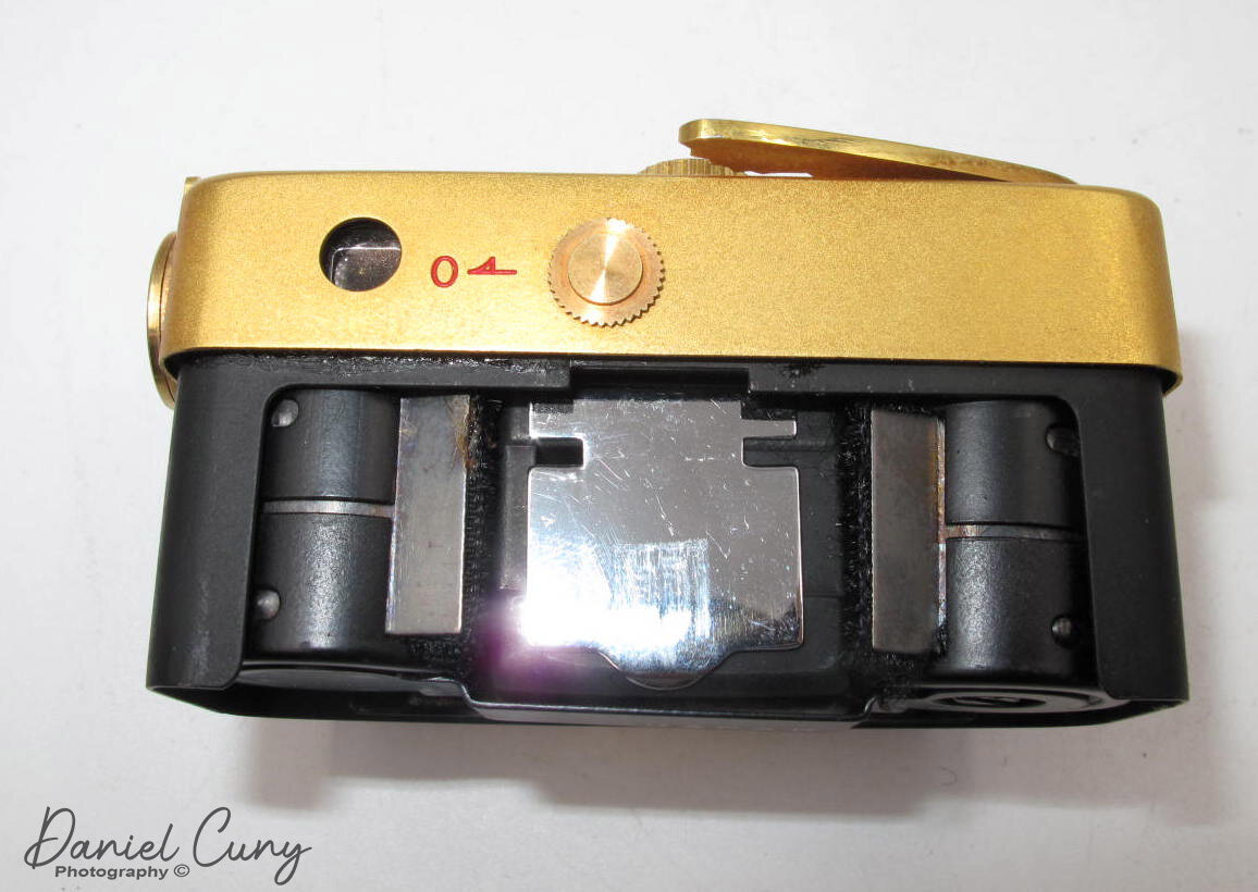 Film casette in camera. Pressure plate down.