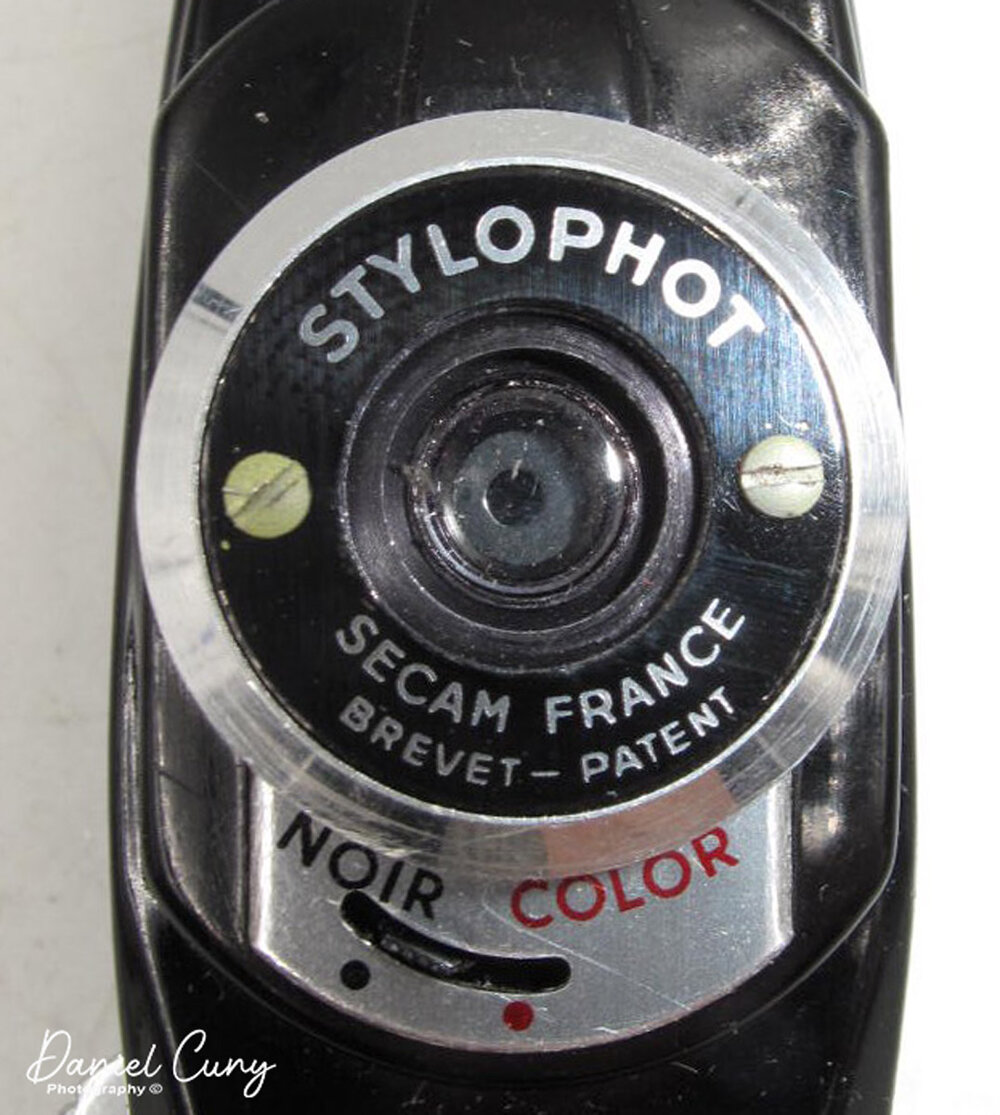 Stylophot camera lens close-up.