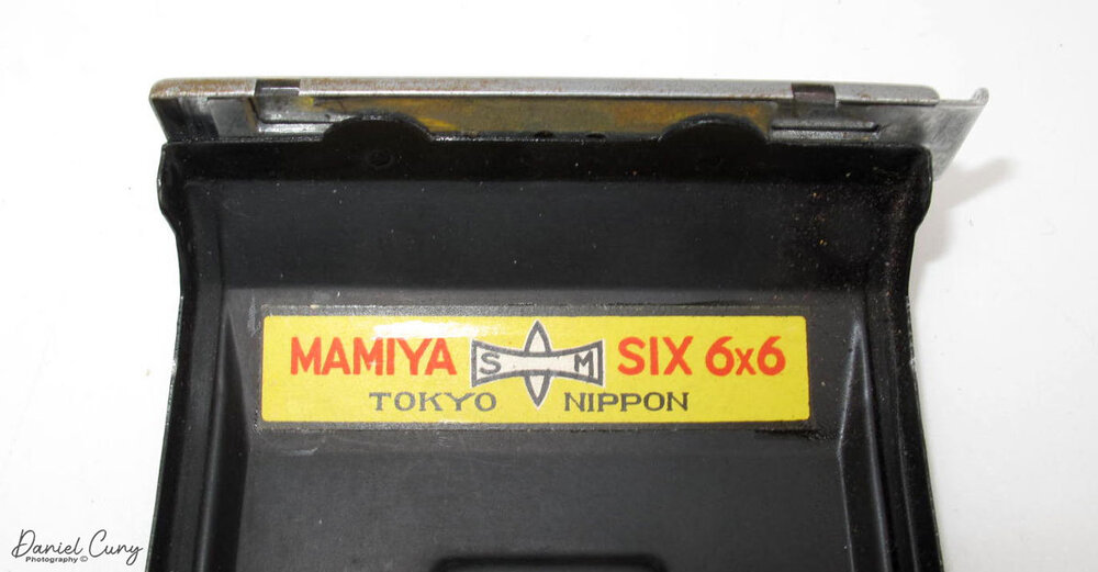 Sticker inside the back door on Mamiya Six