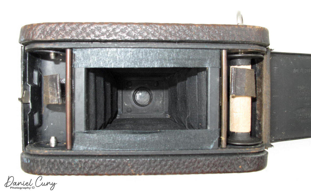 I added tape to reduce the size and to accommodate 35mm film in the No. 0 Folding Pocket Kodak