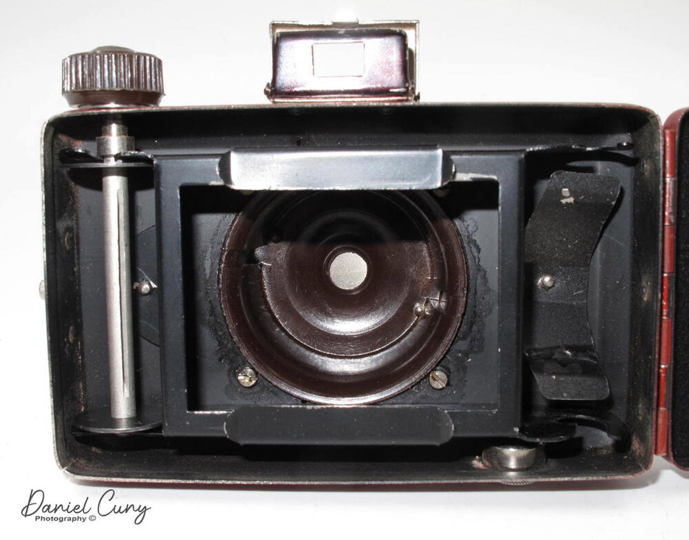 Back open with lens retracted on the Ruberg Art Deco Camera