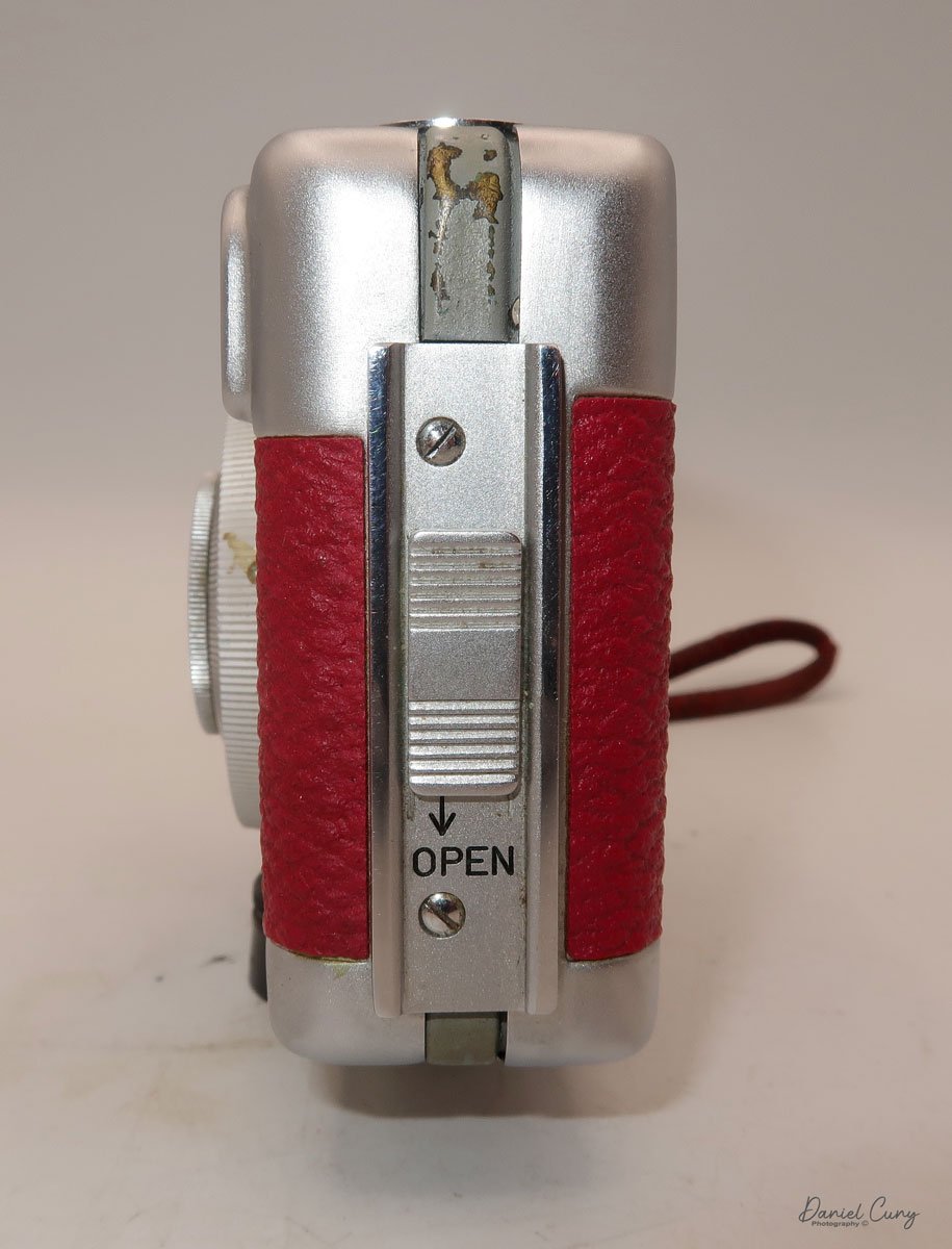 Latch to open film door