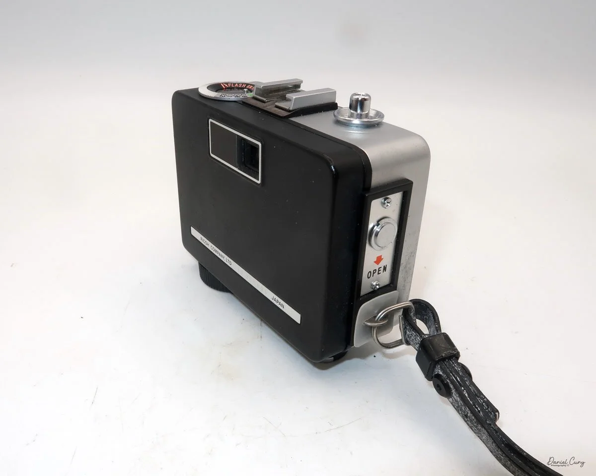 Different angles of the Ricoh Auto Half E2 camera