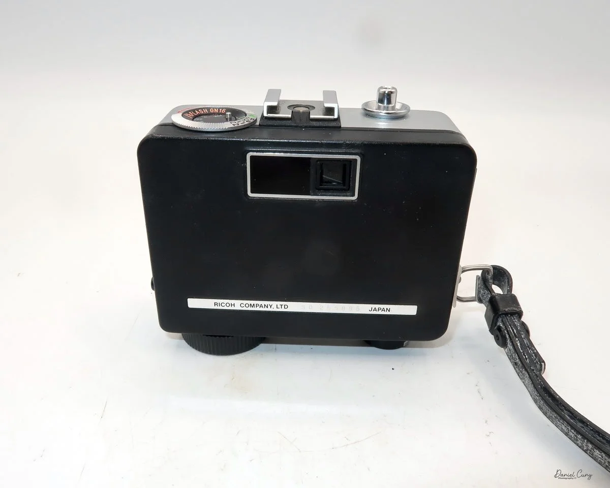 Different angles of the Ricoh Auto Half E2 camera